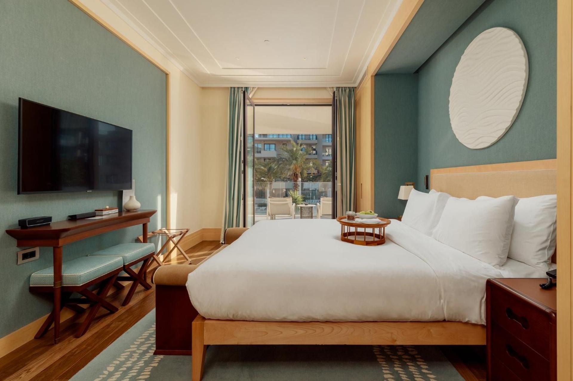King Studio Suite with Balcony and Pool View