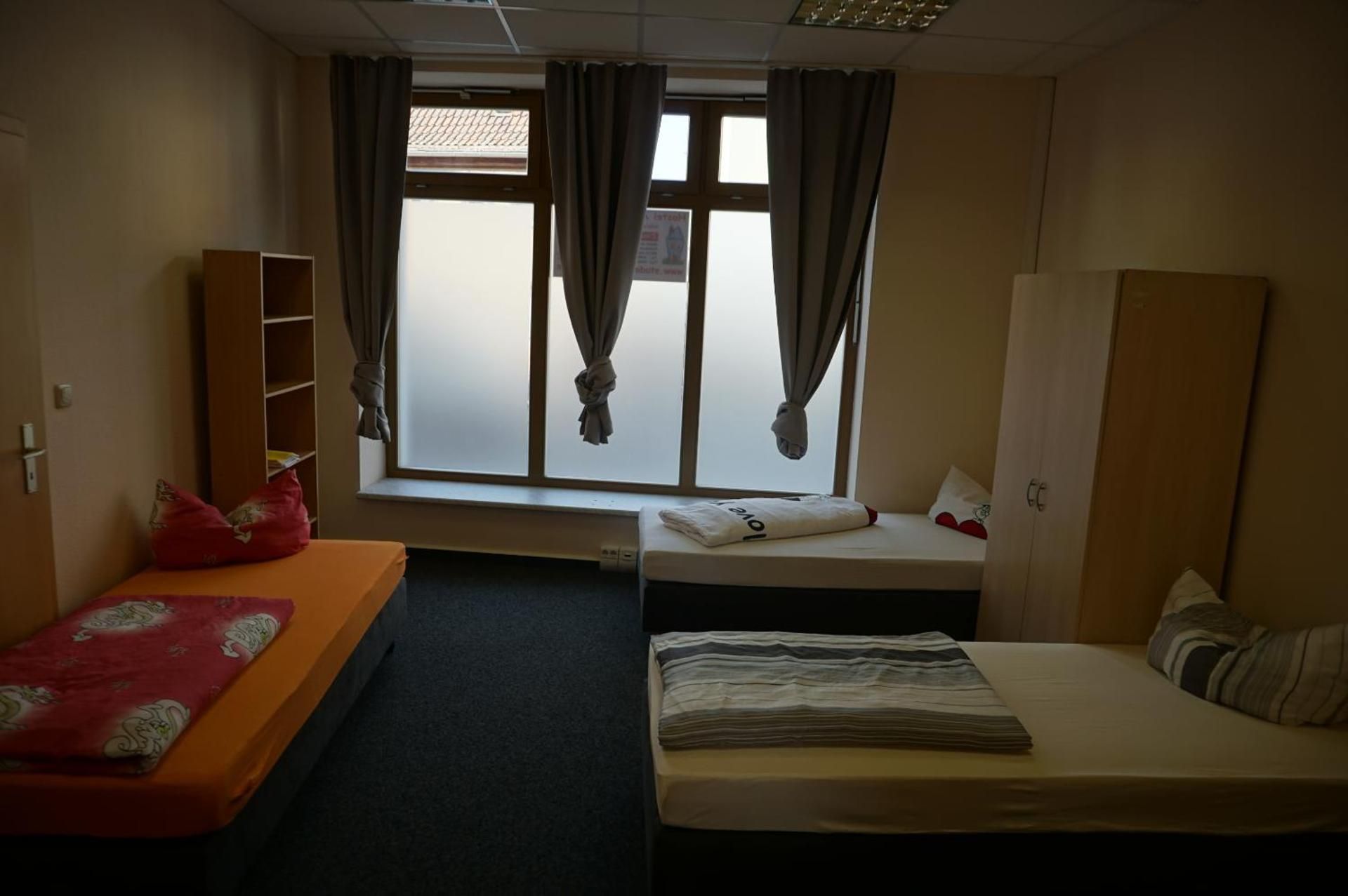 Basic Triple Room with Shared Bathroom