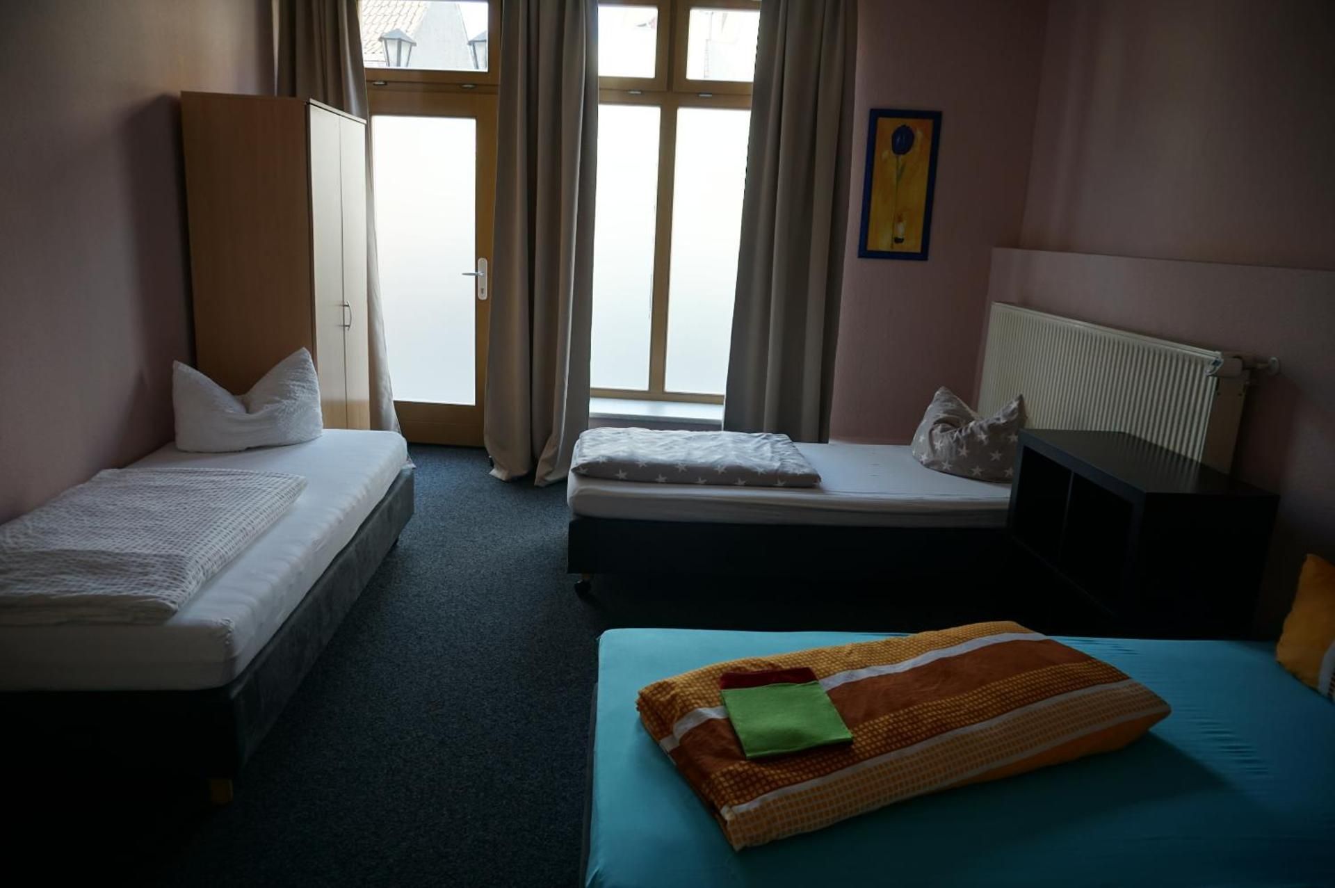 Basic Triple Room with Shared Bathroom