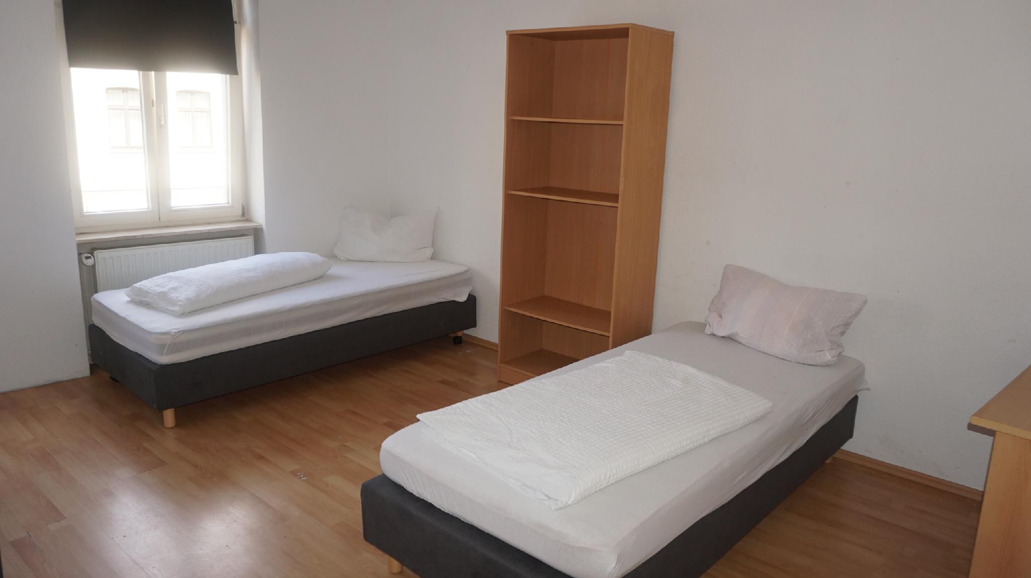 Doppelzimmer-Einfach-Gemeinsames Badezimmer-Gemeinsame Kueche