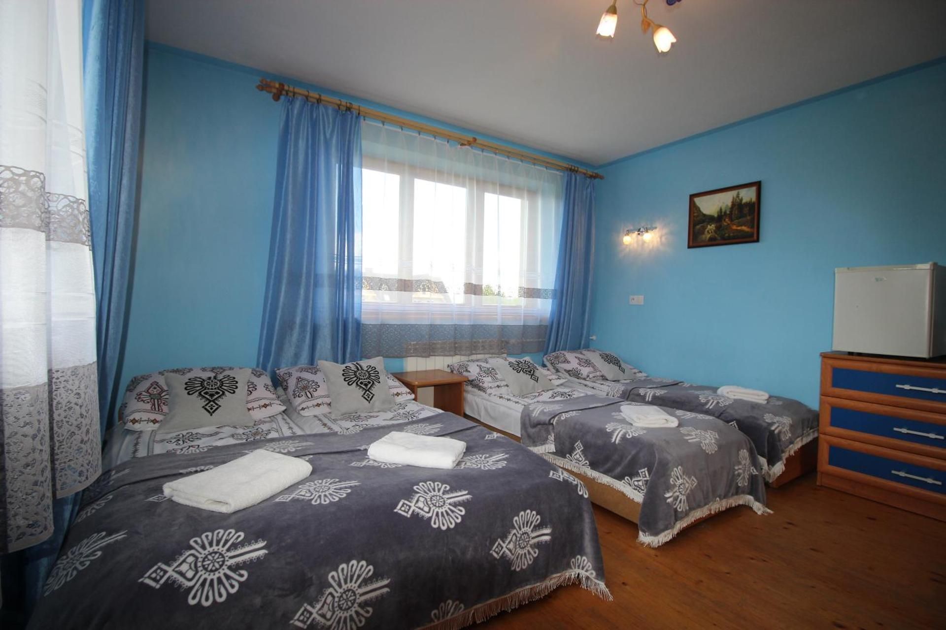 Quadruple Room with Private Bathroom