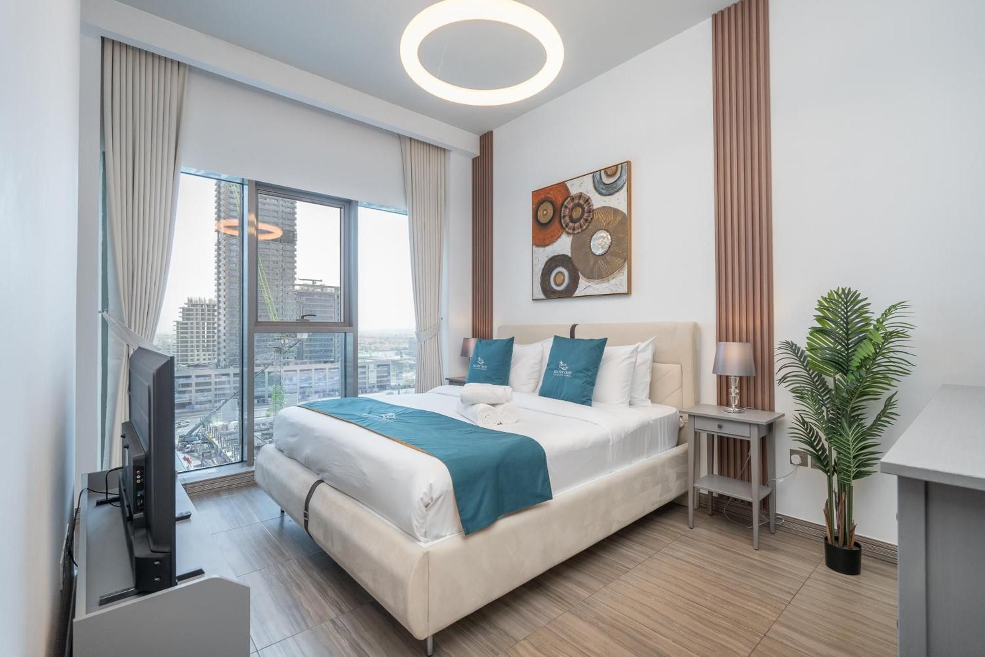 One-Bedroom Apartment with Balcony and City View