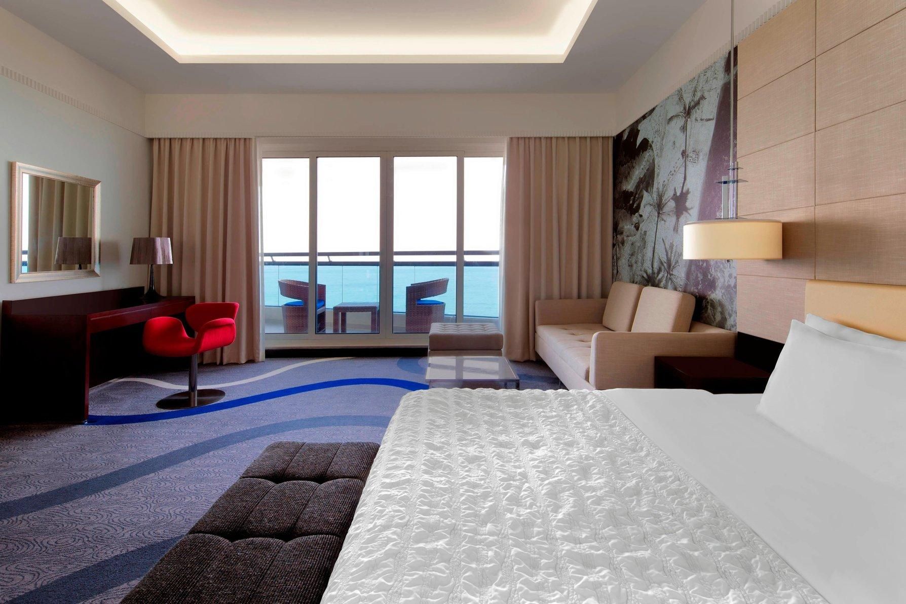 Deluxe Guest room, 1 King, Sofa bed, Ocean view, Balcony