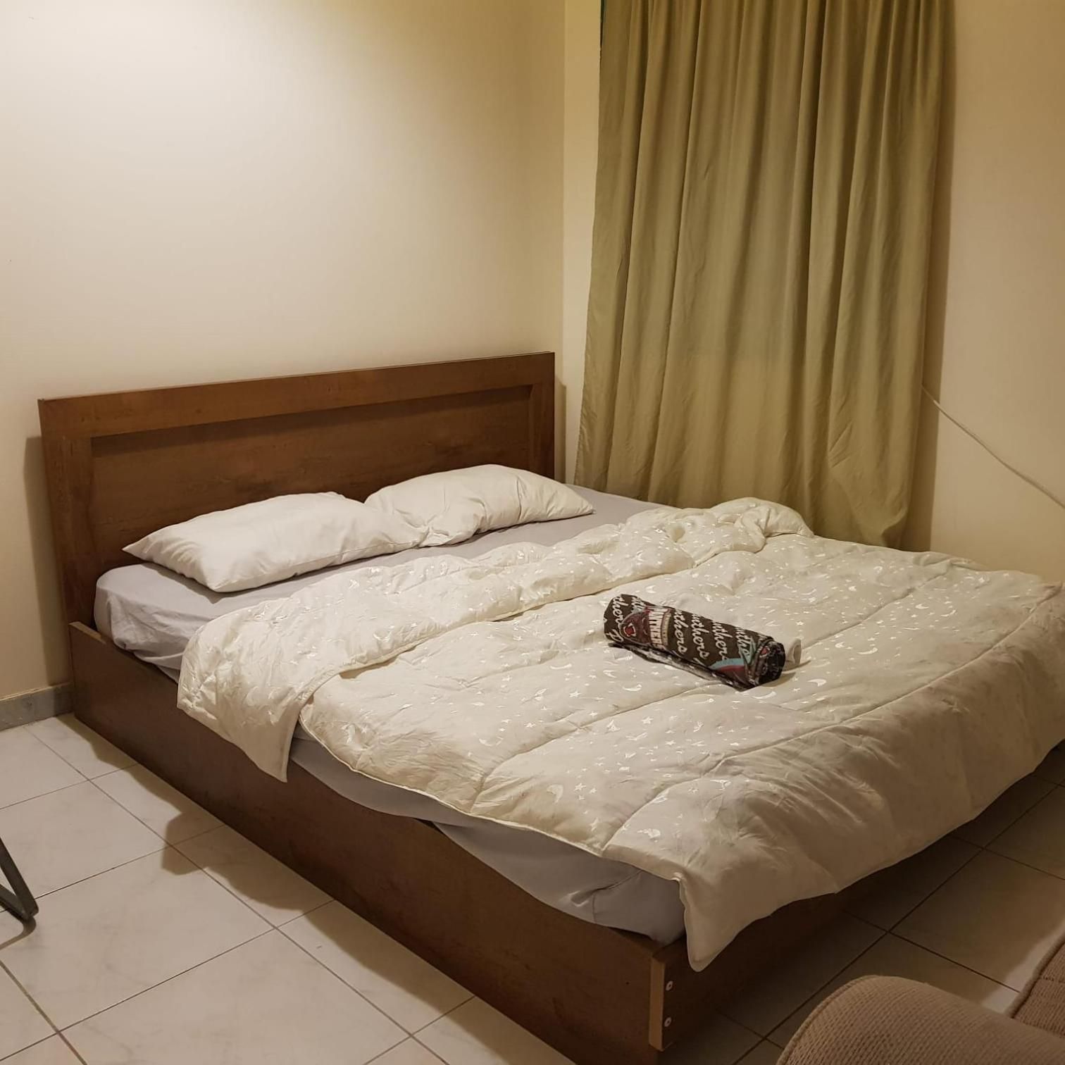 Queen Room with Shared Bathroom