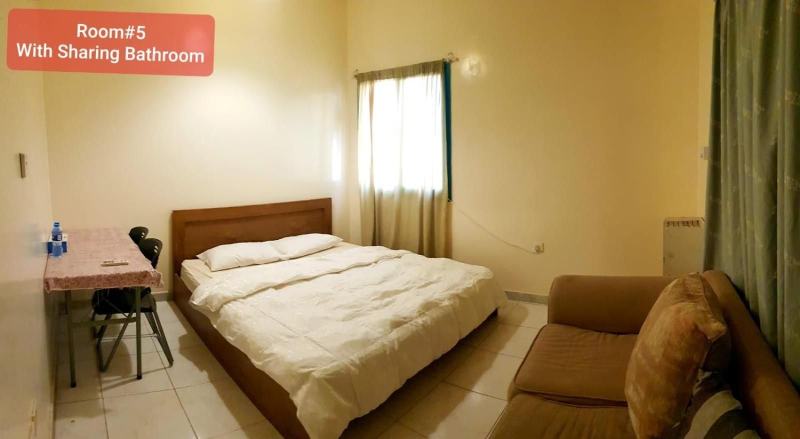 Queen Room with Shared Bathroom