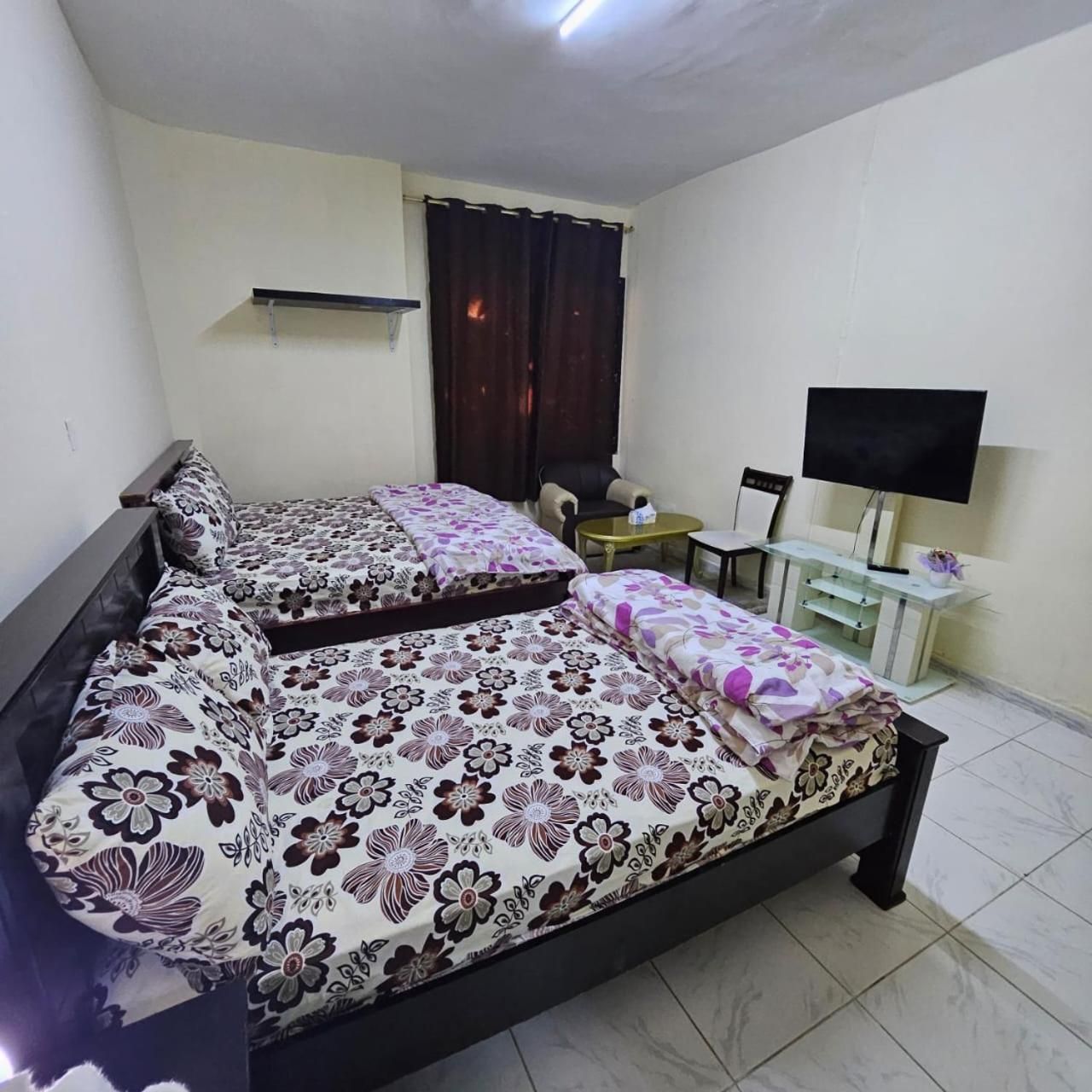 Quadruple Room with Shared Bathroom