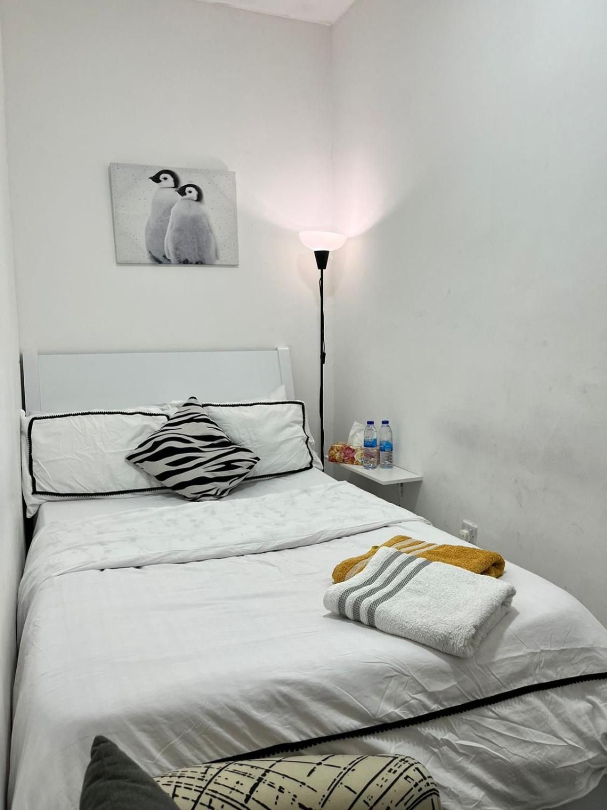 Queen Room with Shared Bathroom