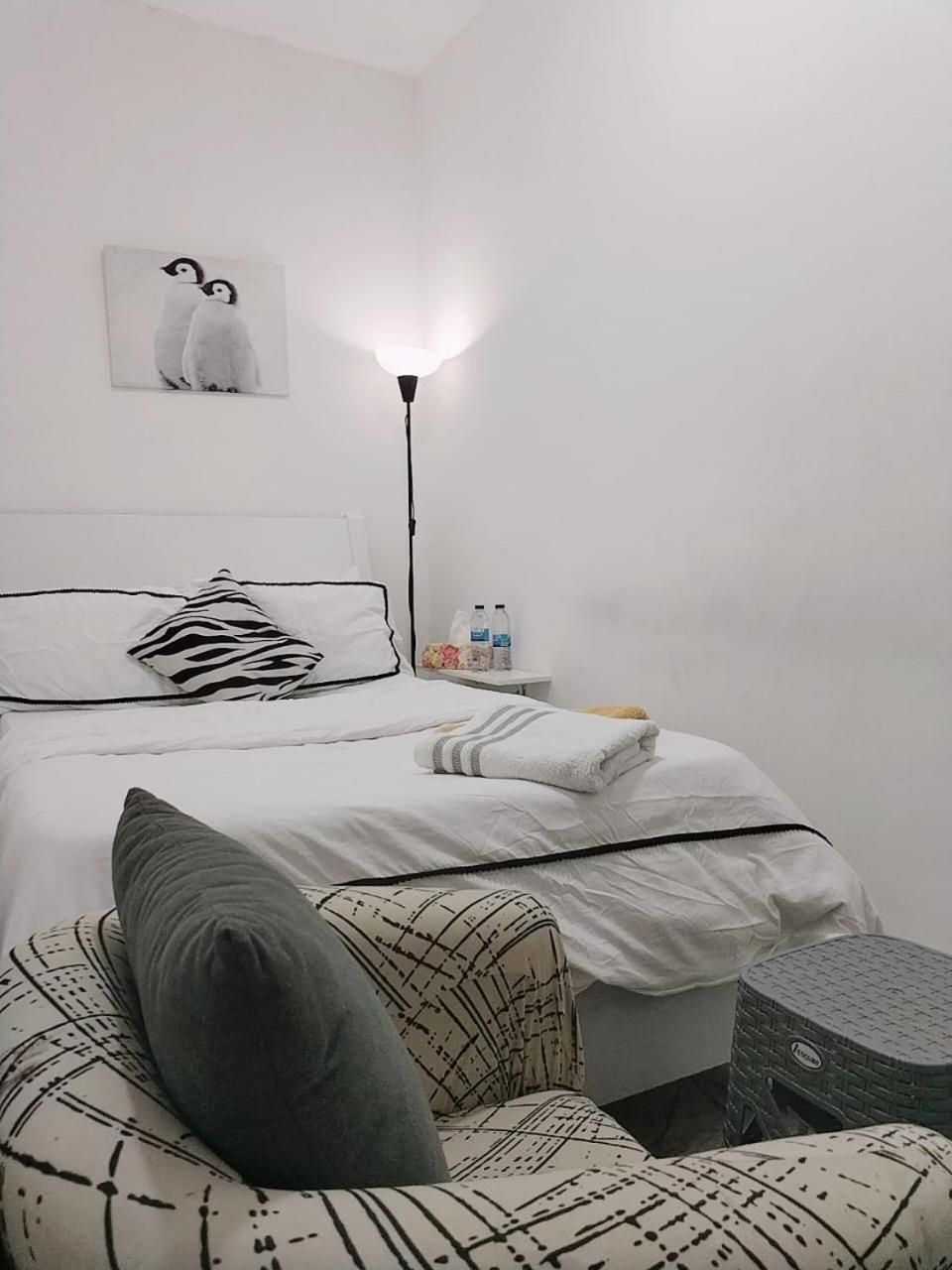 Queen Room with Shared Bathroom