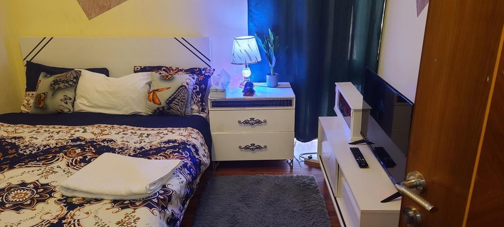 Queen Room with Shared Bathroom