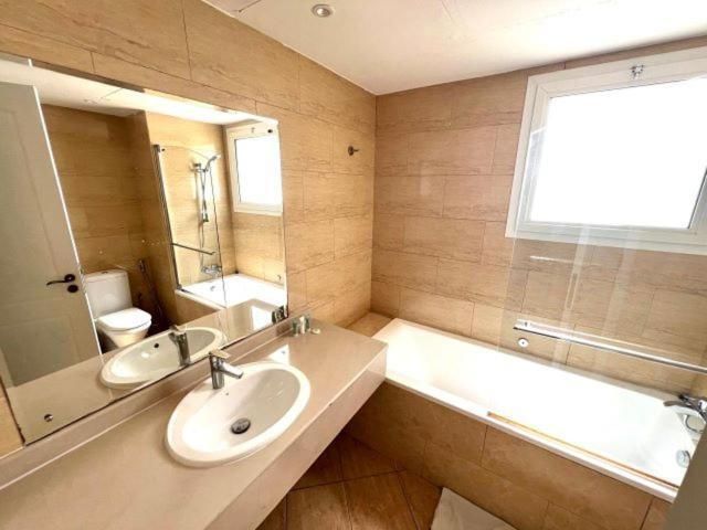 Two-Bedroom Apartment with Balcony and Sea View