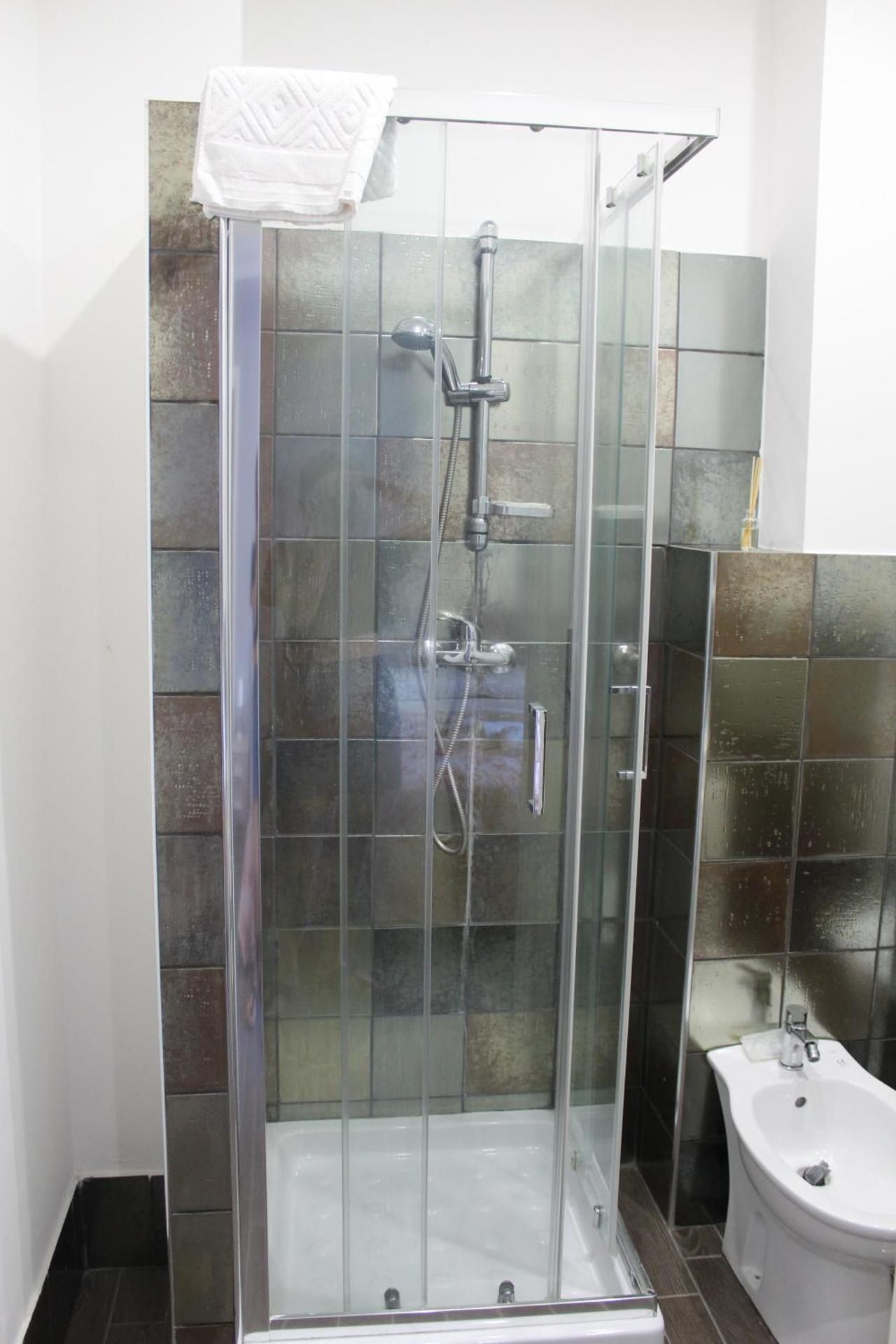 Quadruple Room with Private Bathroom