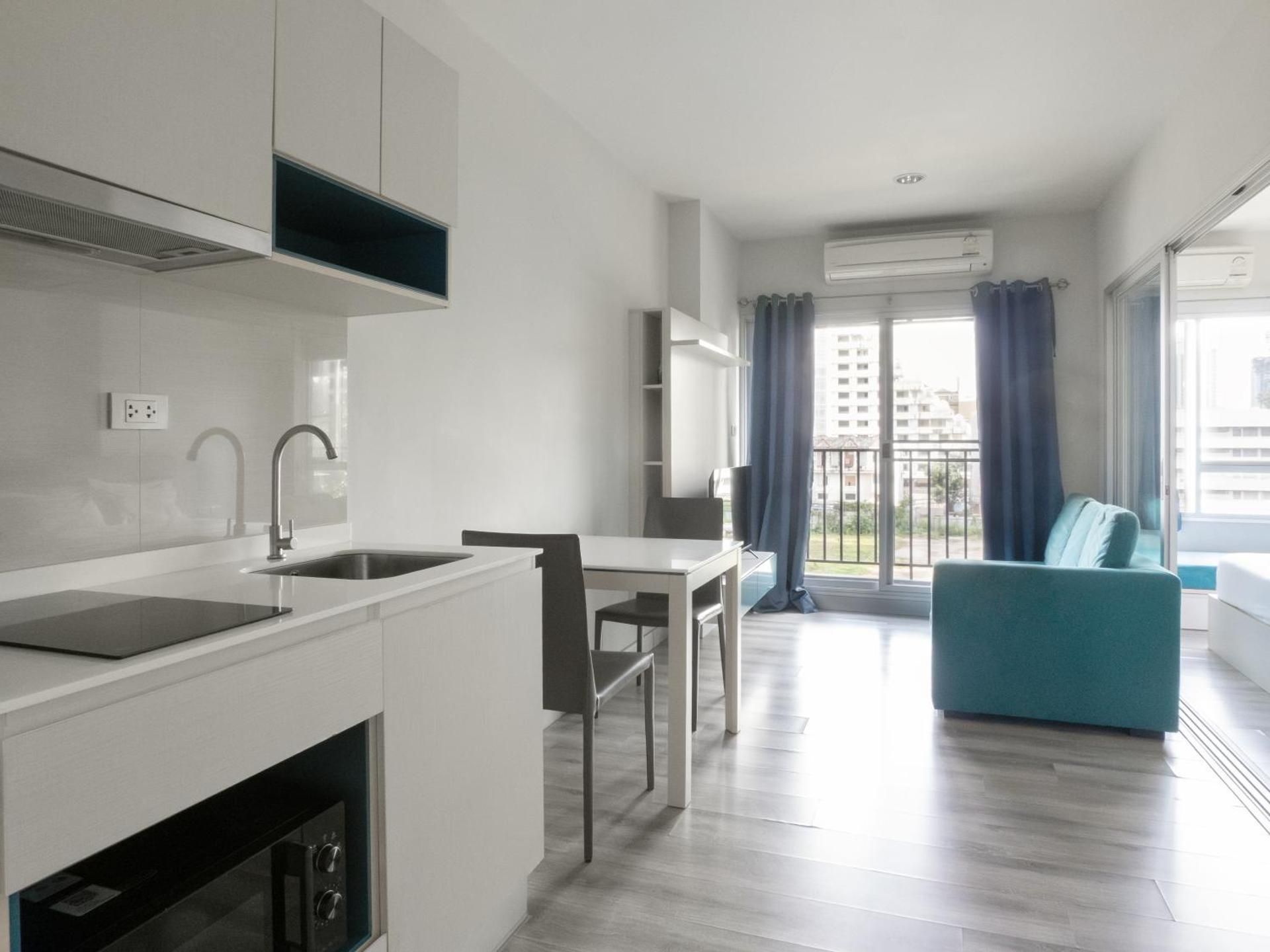 One-Bedroom Apartment with Balcony and City View