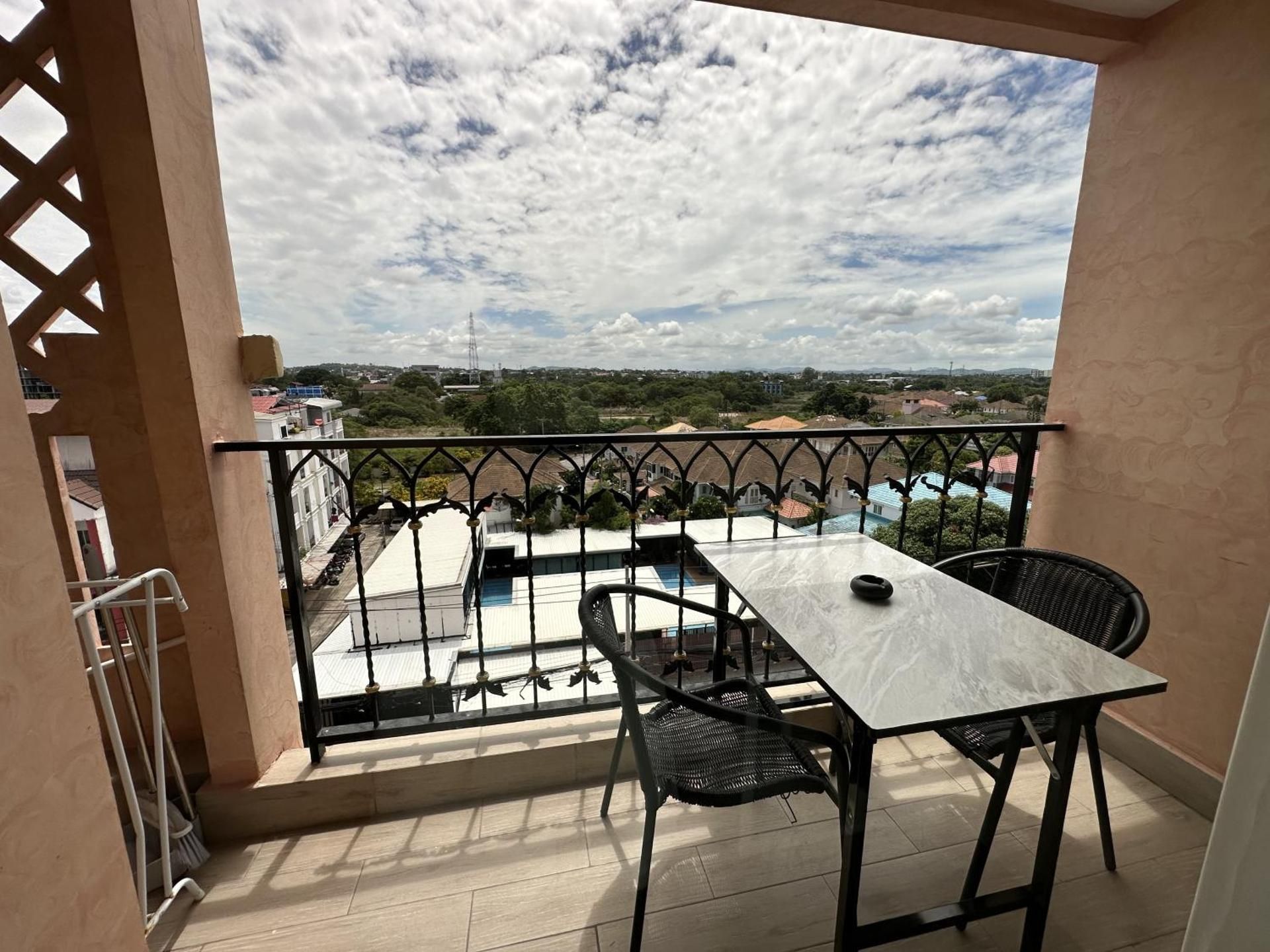 One-Bedroom Apartment with Balcony and City View