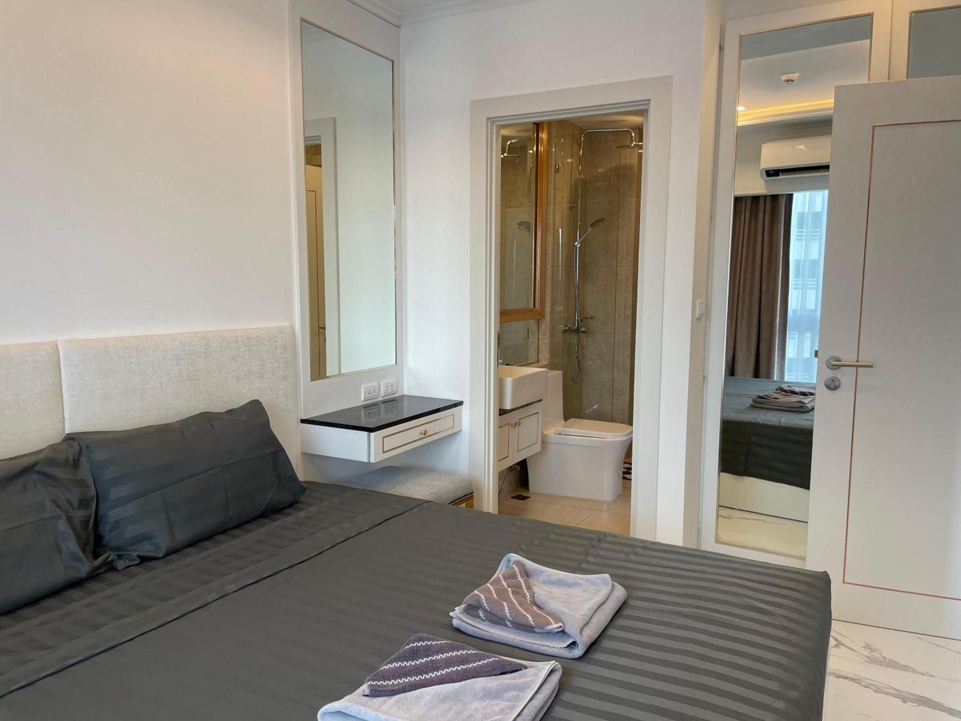 One-Bedroom Apartment with Balcony and City View