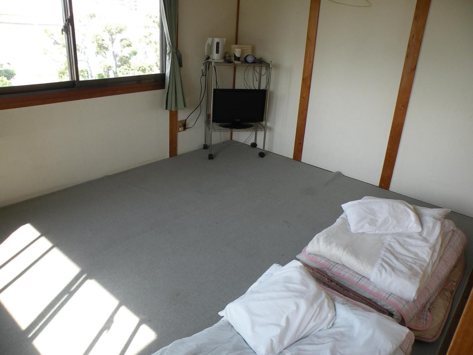 Triple Room with Shared Bathroom