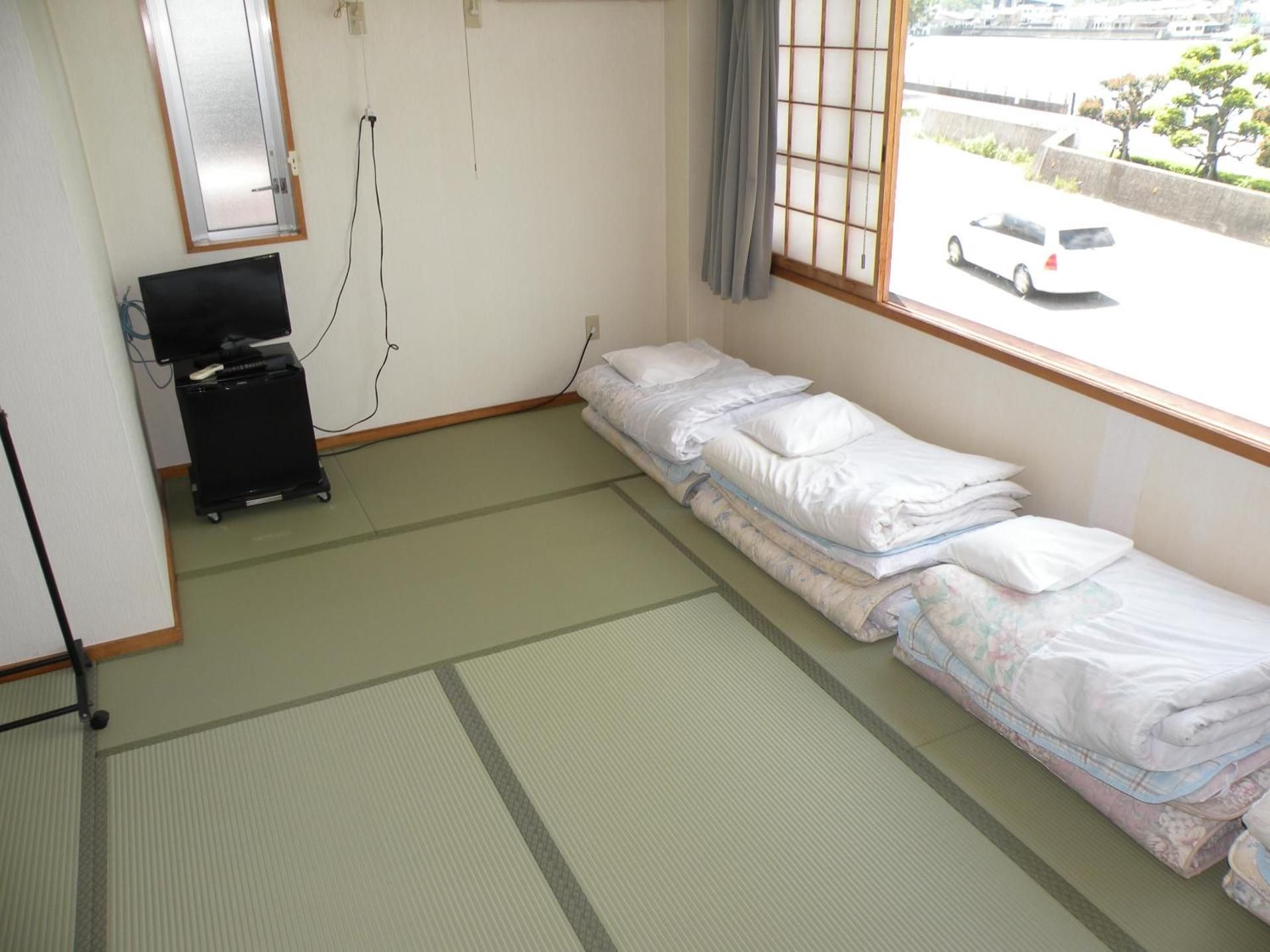 Quadruple Room with Private Bathroom