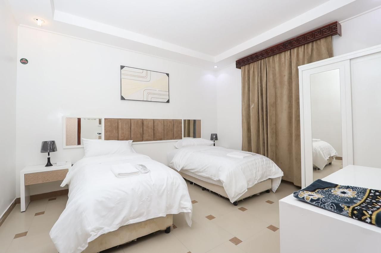 Two-Bedroom Apartment Two-Bathroom Apartment 