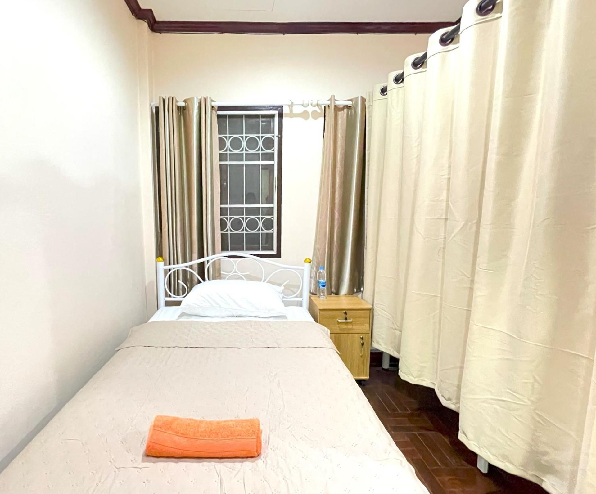 Single Bed in Dormitory Room