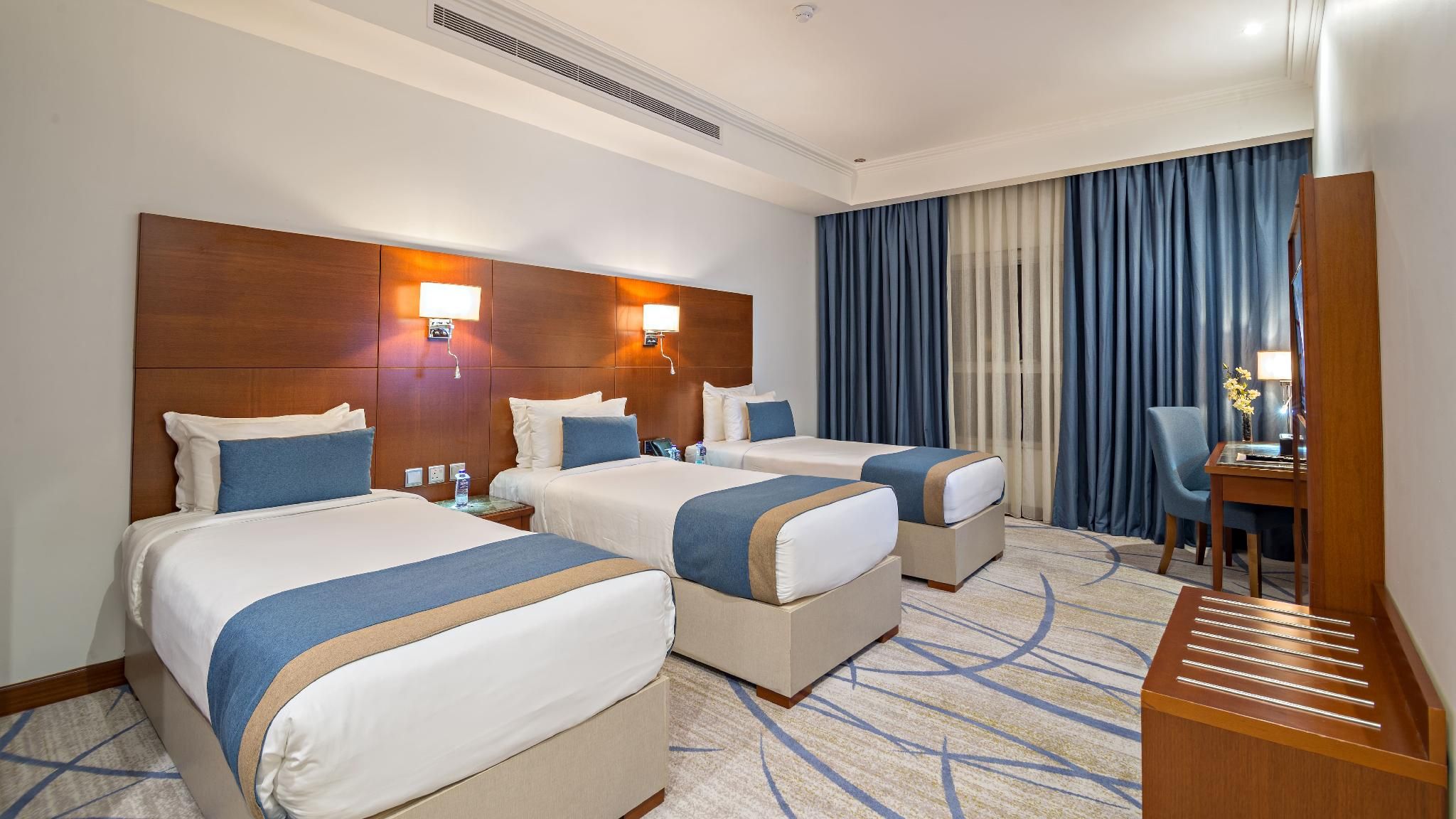 Deluxe Triple Room