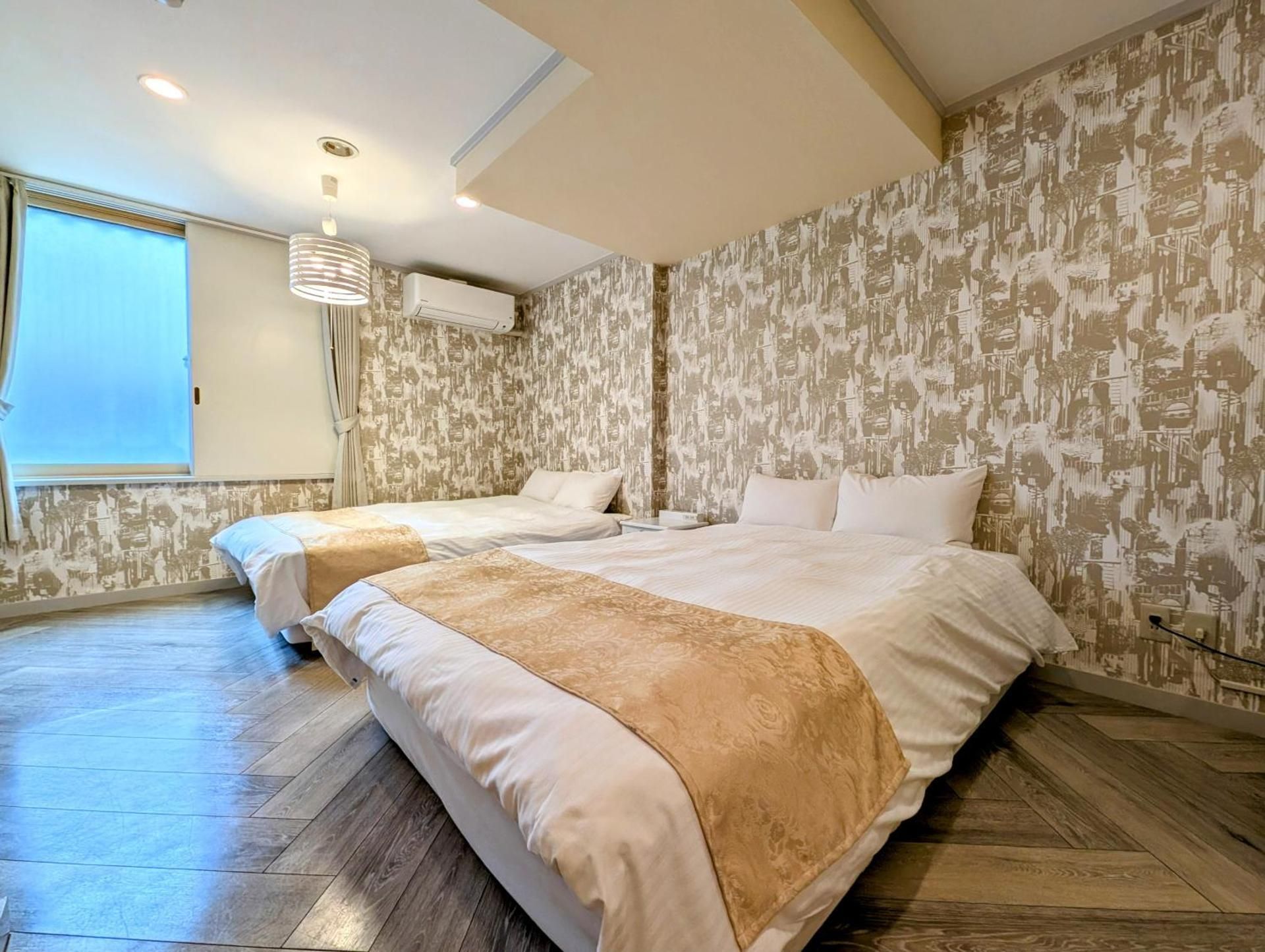 Moderate Twin Room with Two Double Beds