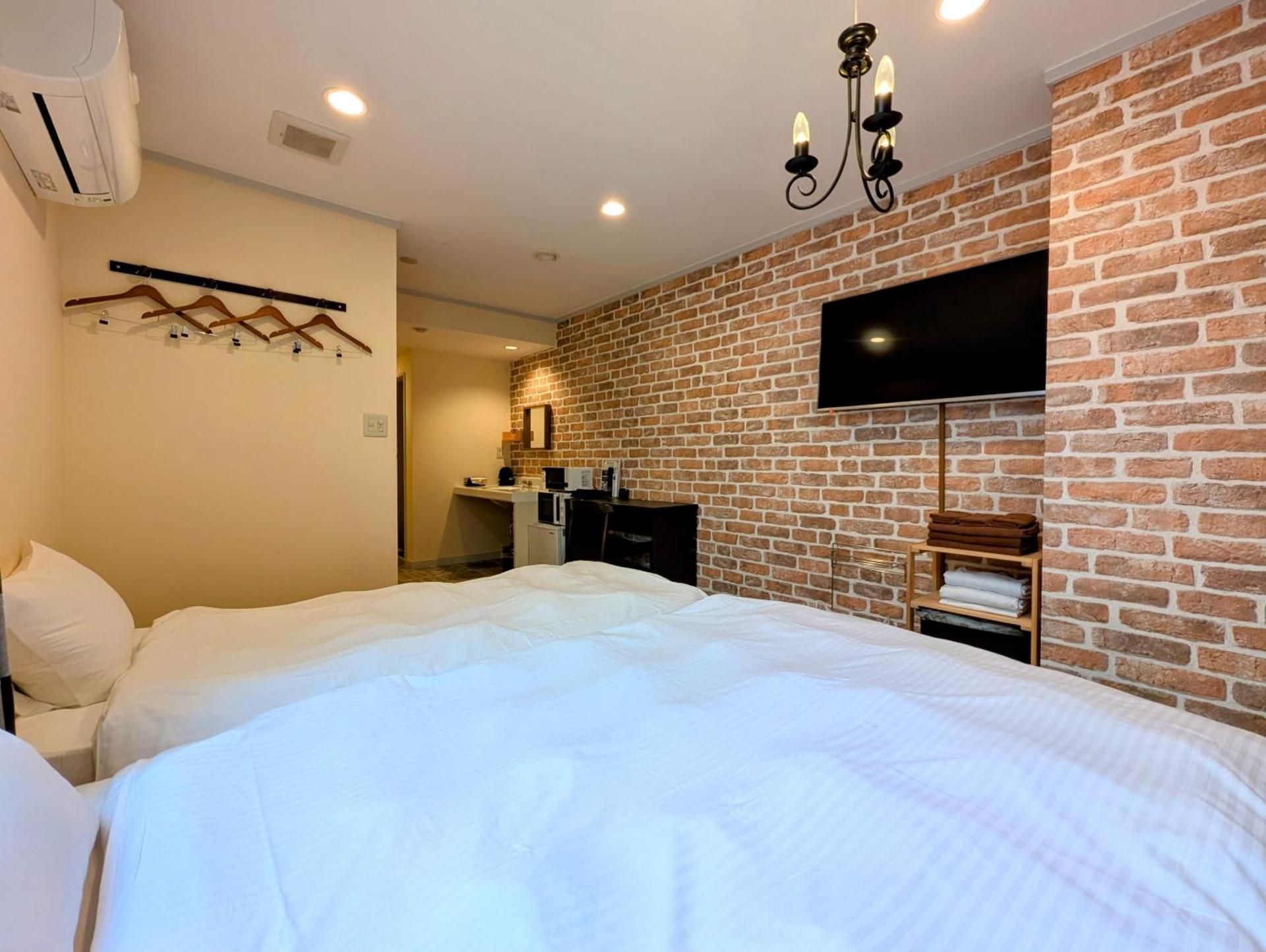 Moderate Room with One Single Bed and One Double Bed