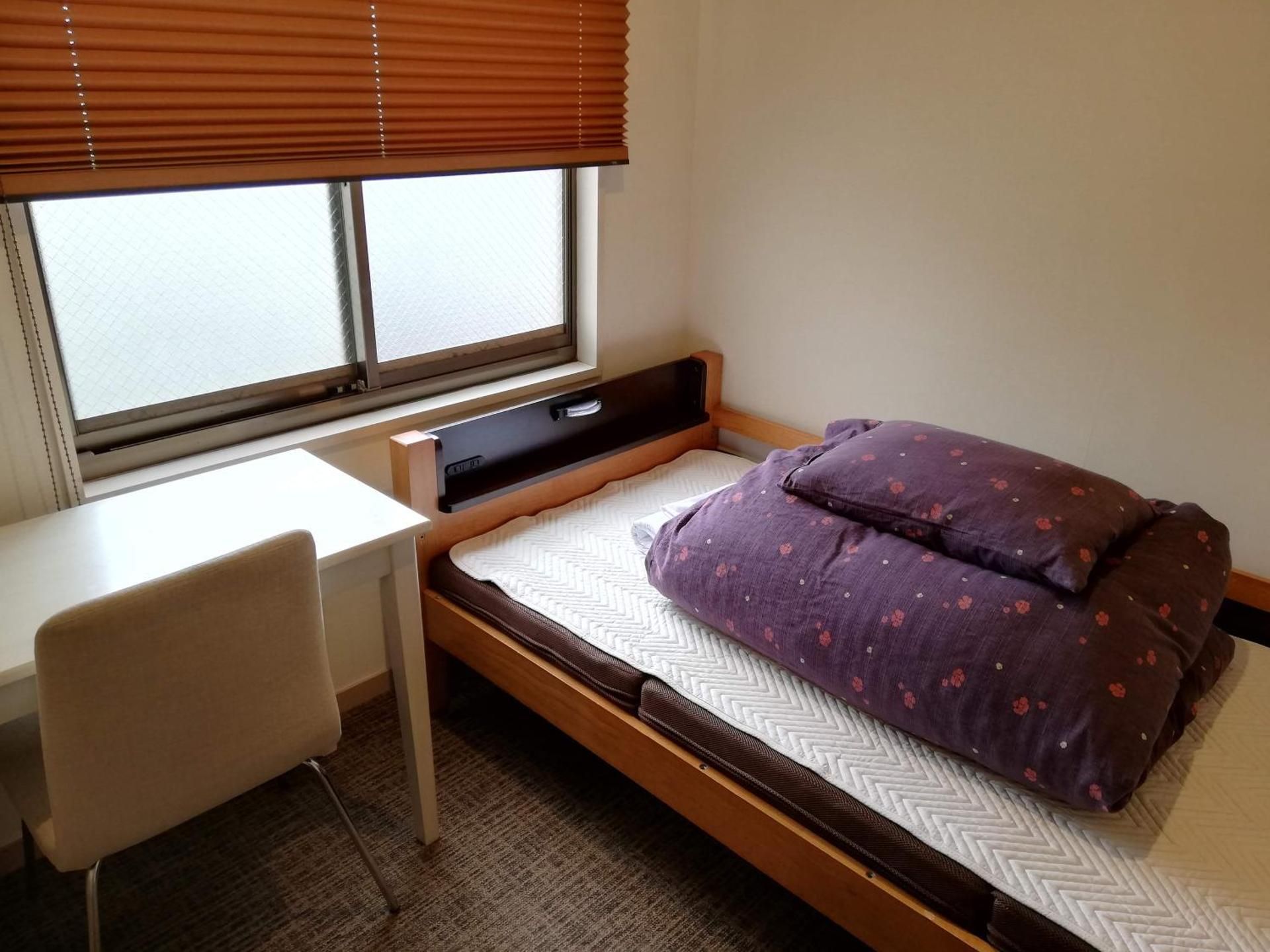 Basic Single Room with Shared Bathroom