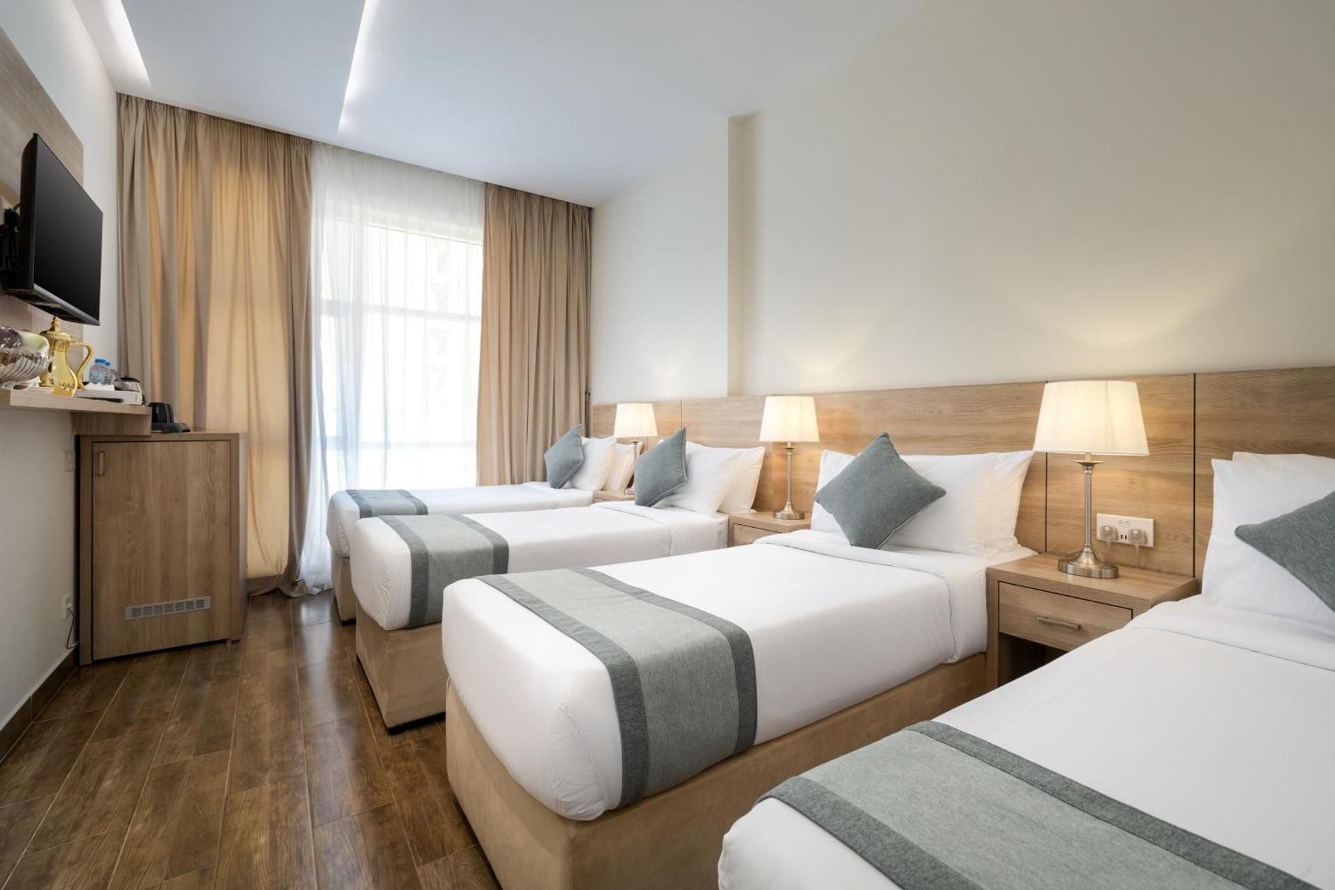 Worth Elite Hotel Quadraple Room