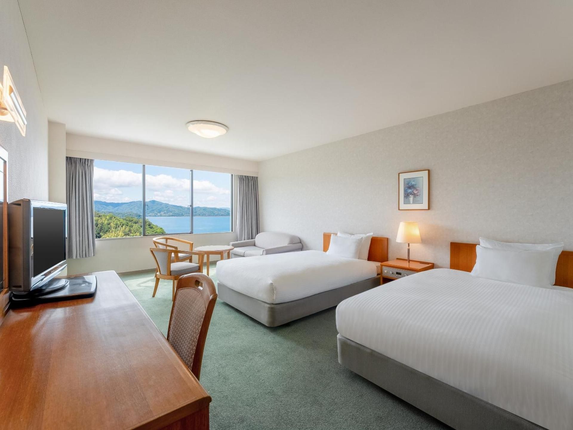 Classic Room with 2 single beds and 1 sofa bed, Ocean/Sea view