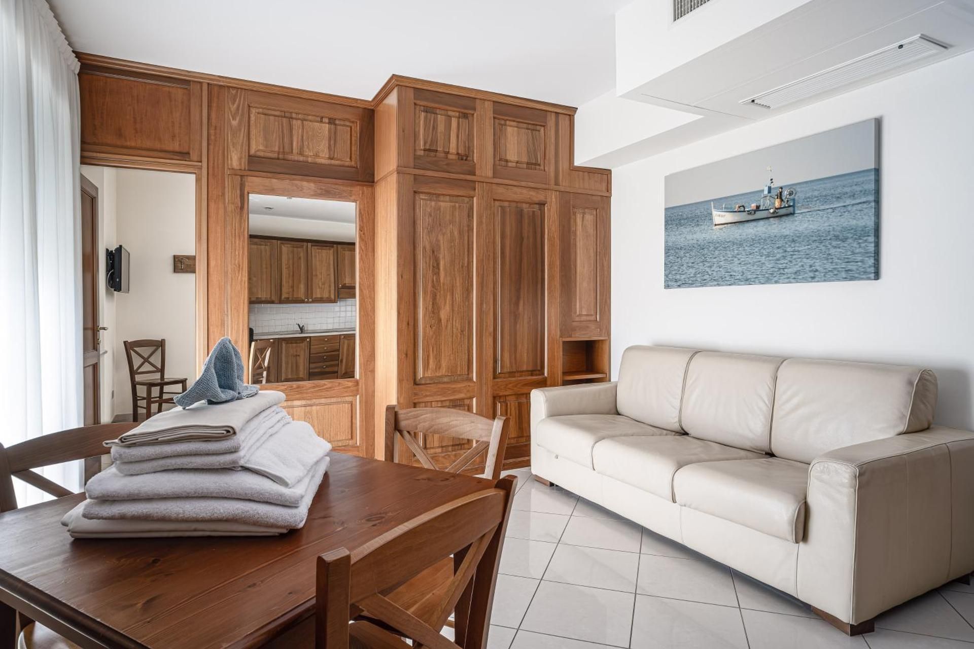 One-Bedroom Apartment with Balcony and Sea View