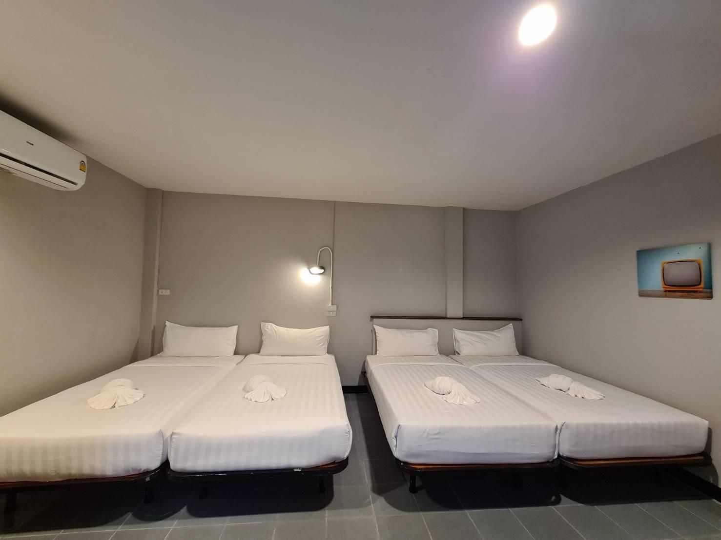 Family Room with 4 Single Beds and Private Bathroom