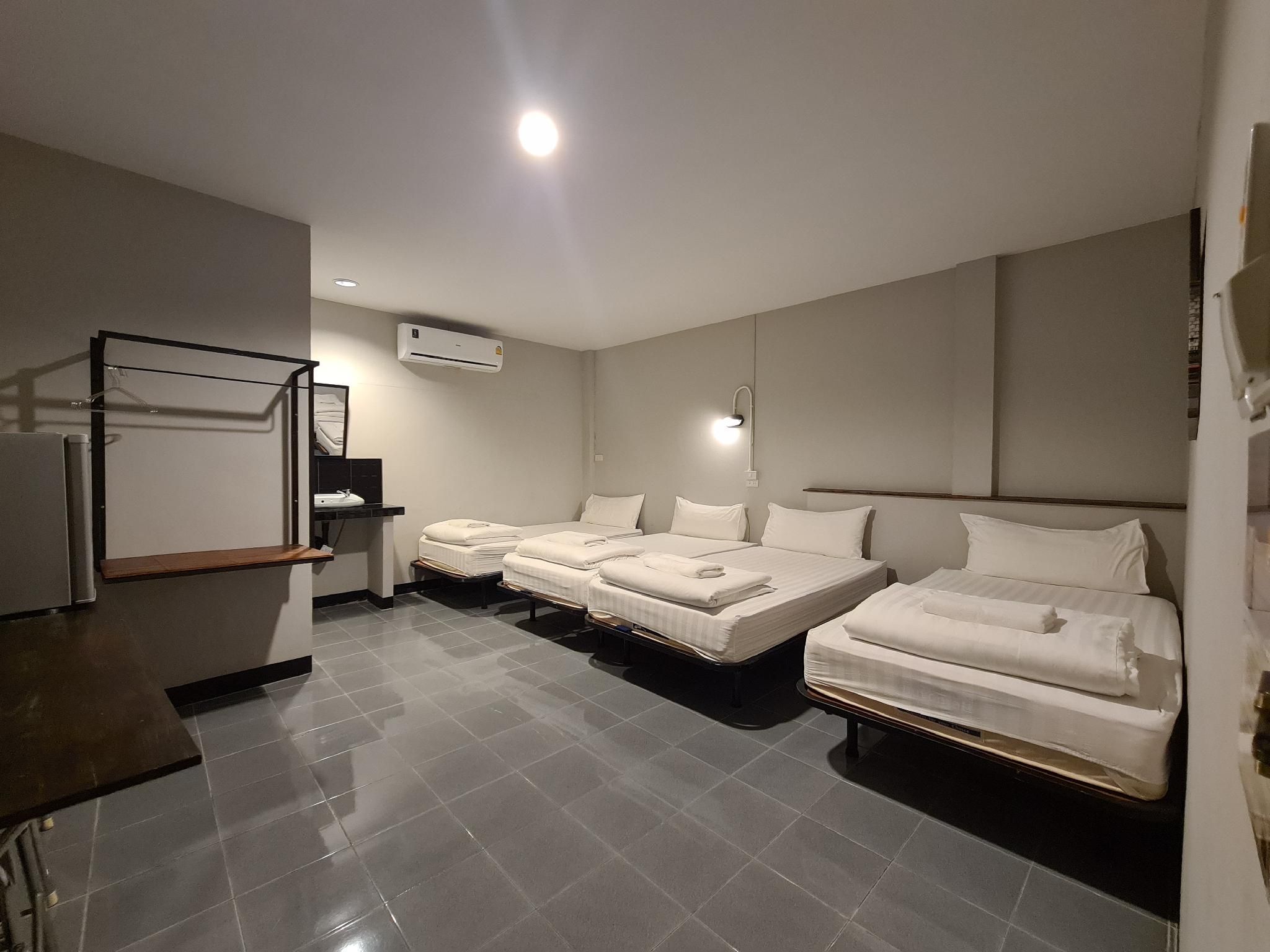 Family Room with 4 Single Beds and Private Bathroom