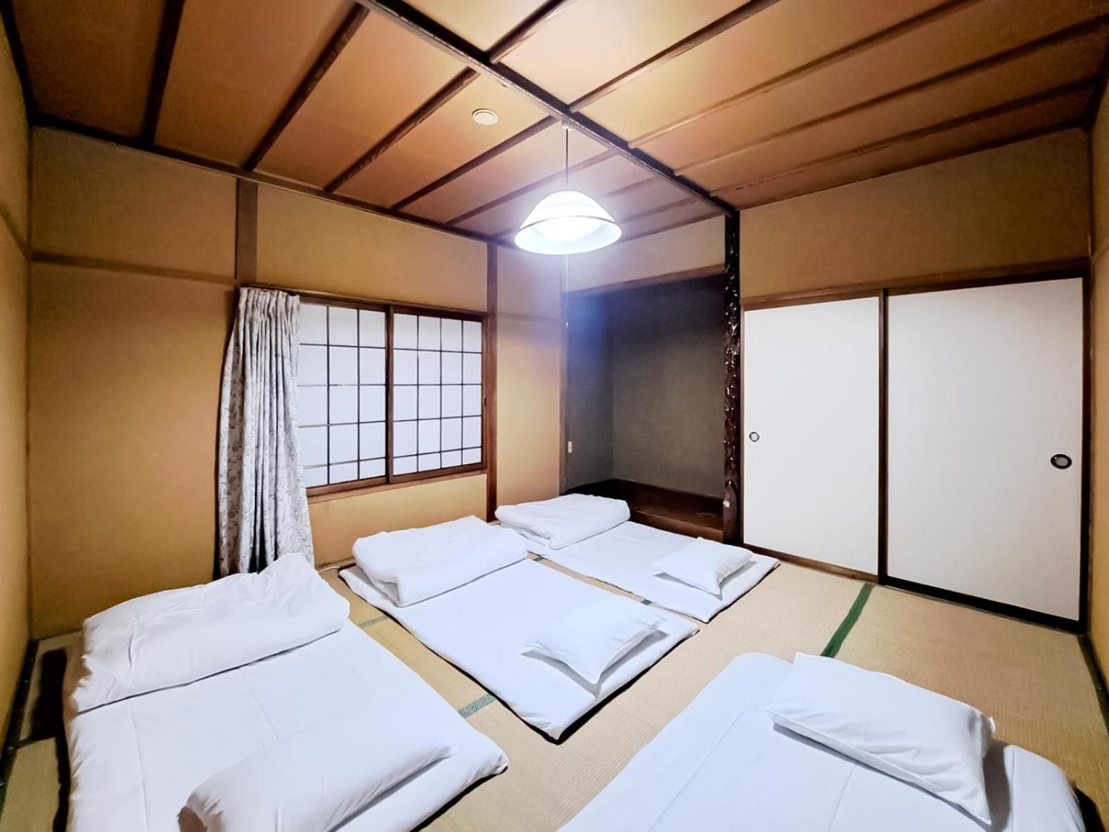 Quadruple Room with Shared Bathroom