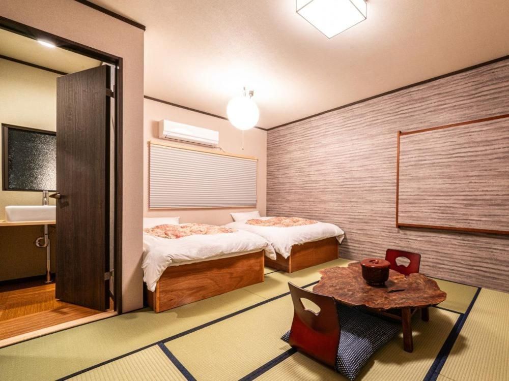 Twin Room with Shared Bathroom