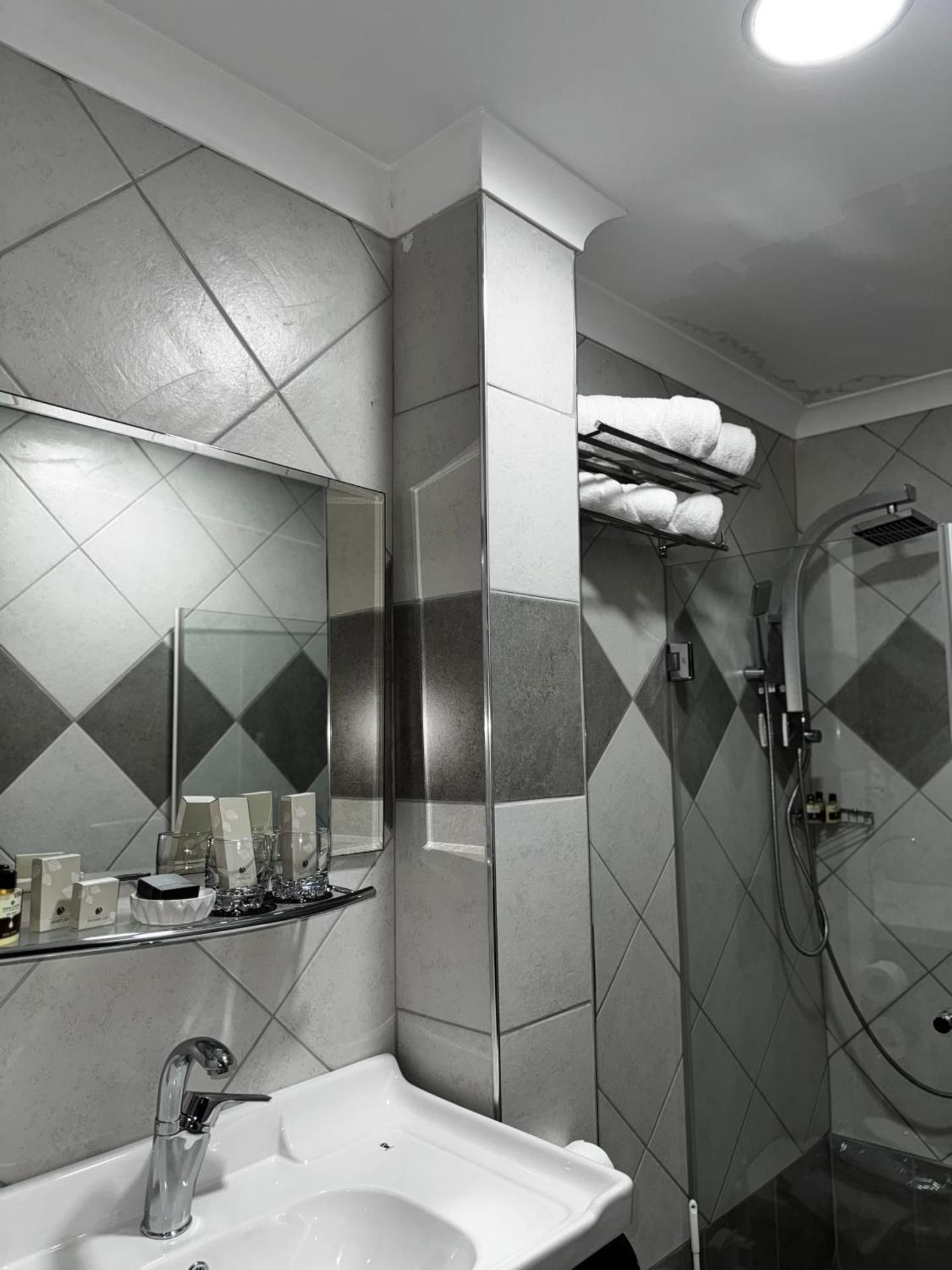 Deluxe Room (2 Adults + 1 Child)