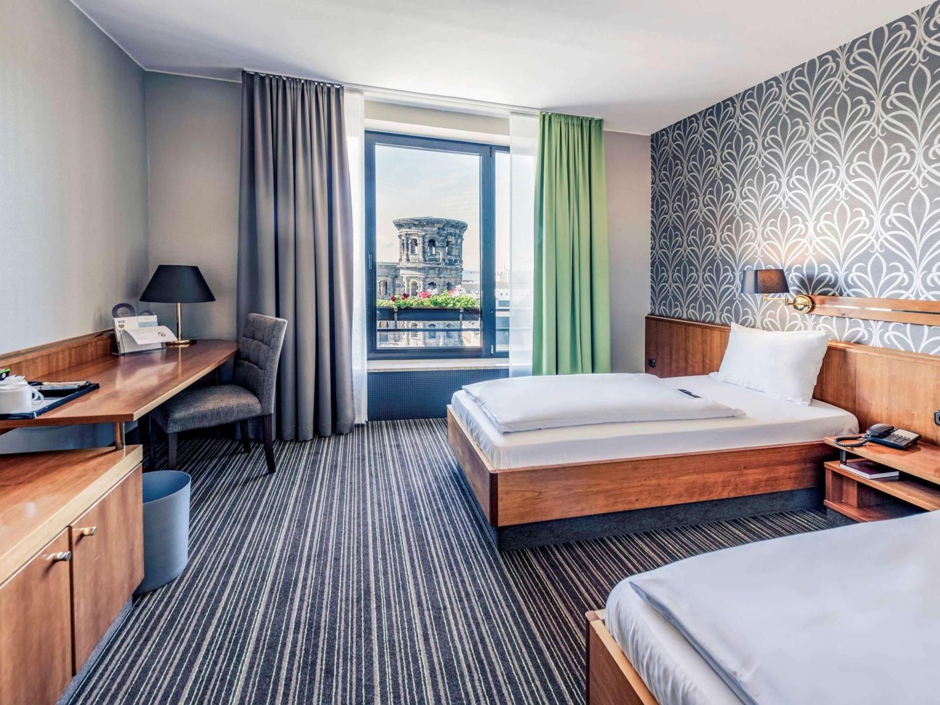 Mercure Hotel Trier Porta Nigra Superior Room with 2 single beds and a view of the Porta Nigra