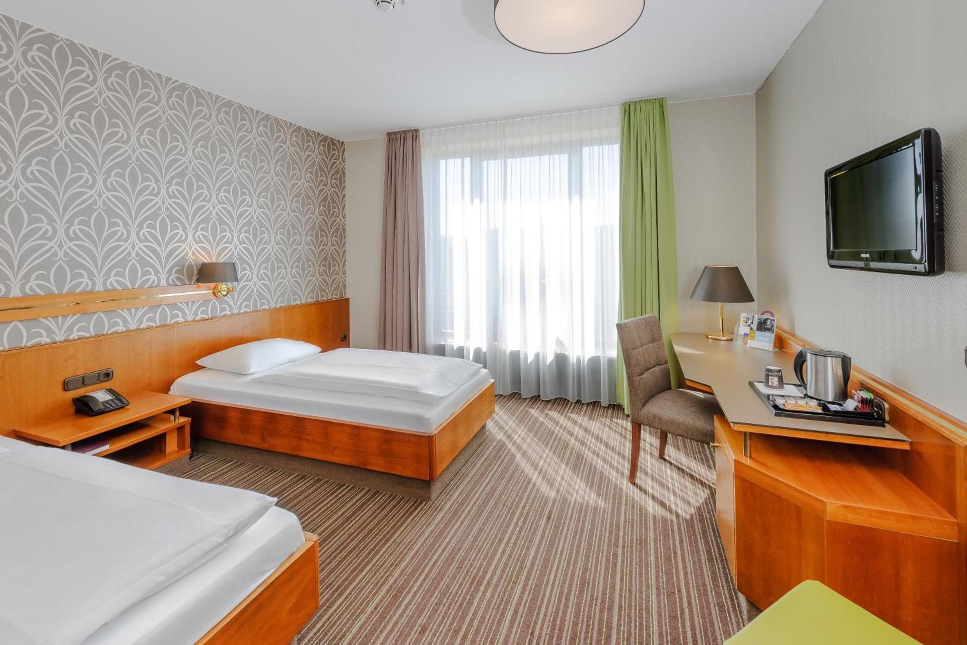 Mercure Hotel Trier Porta Nigra Superior Room with 2 single beds and a view of the Porta Nigra 2