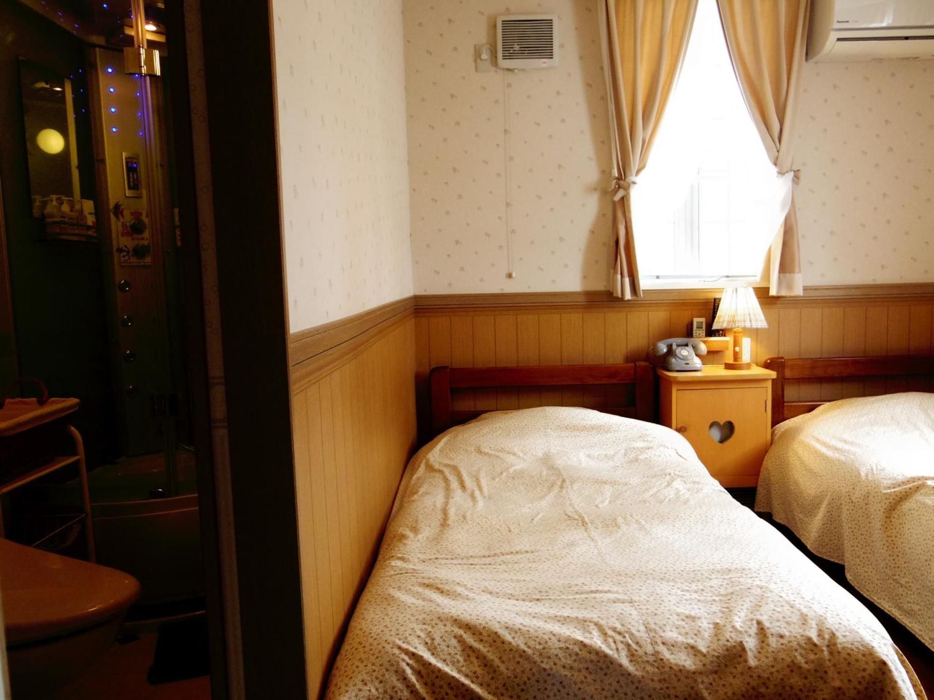 Twin Room with Private Shower and Toilet