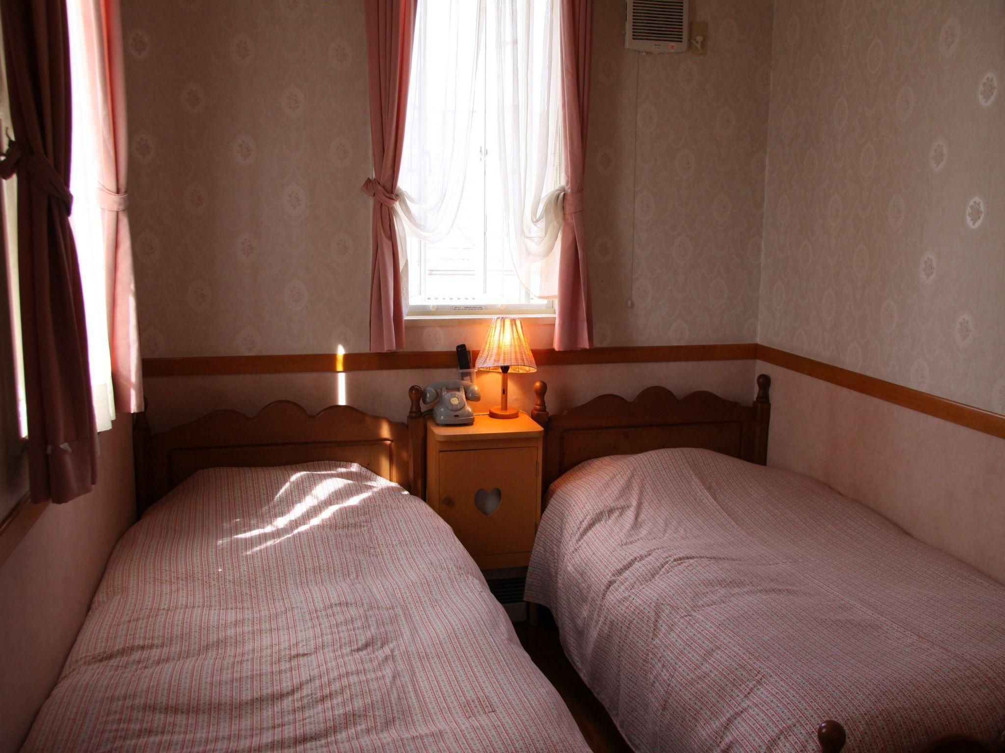 Twin Room with Private Bathroom - Non-Smoking