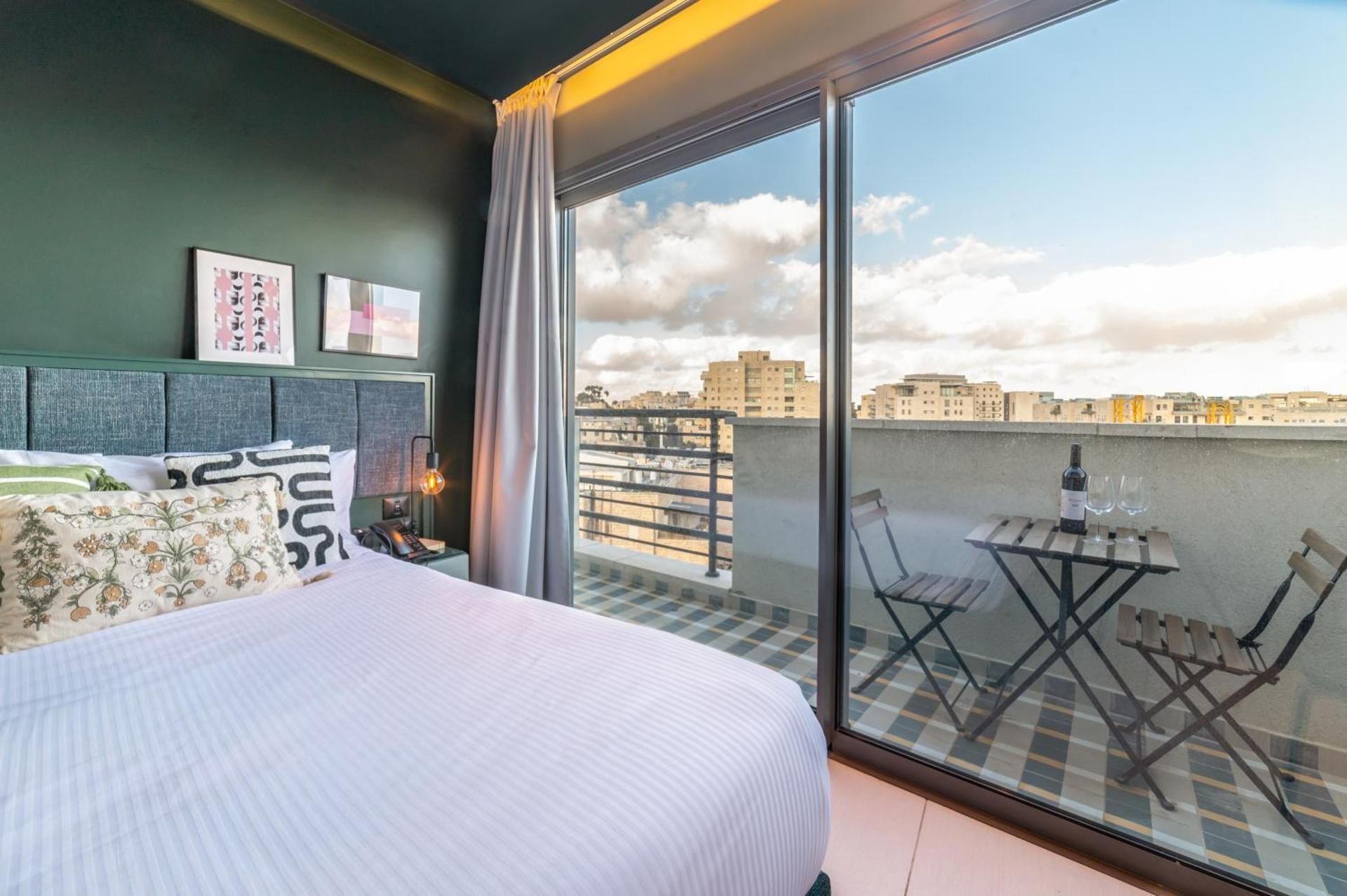 Top Floor Deluxe Suite with Balcony