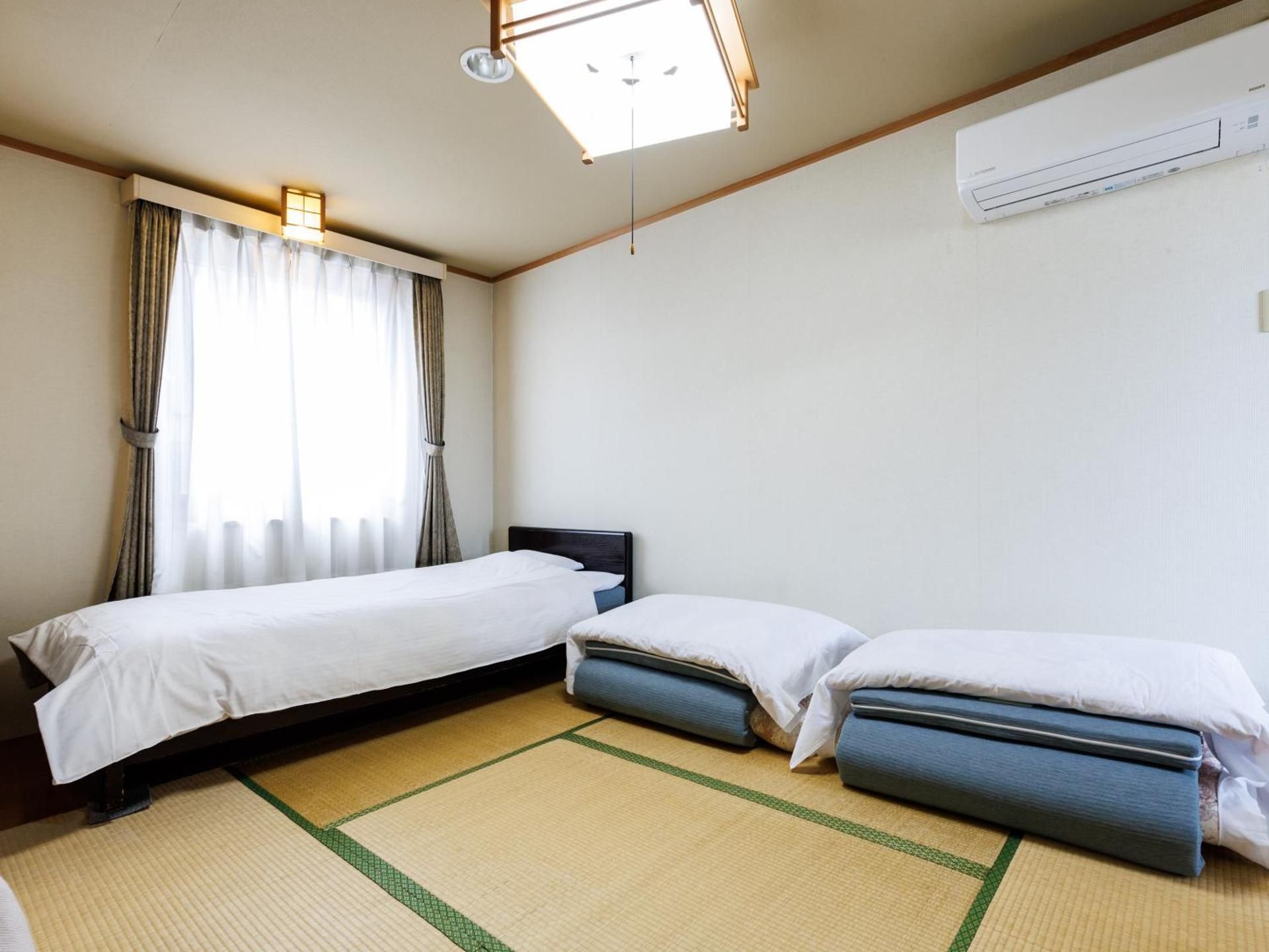 Triple Room with Shared Bathroom