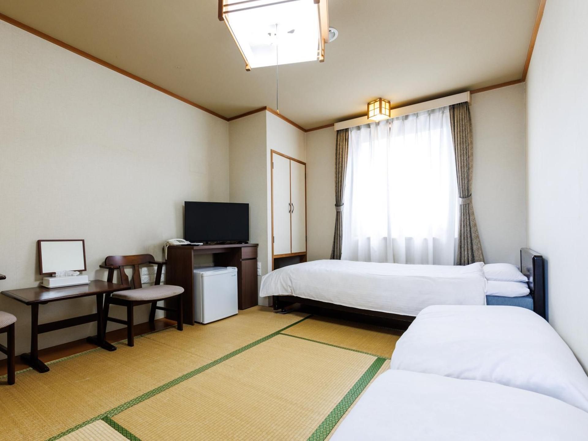 Triple Room with Shared Bathroom