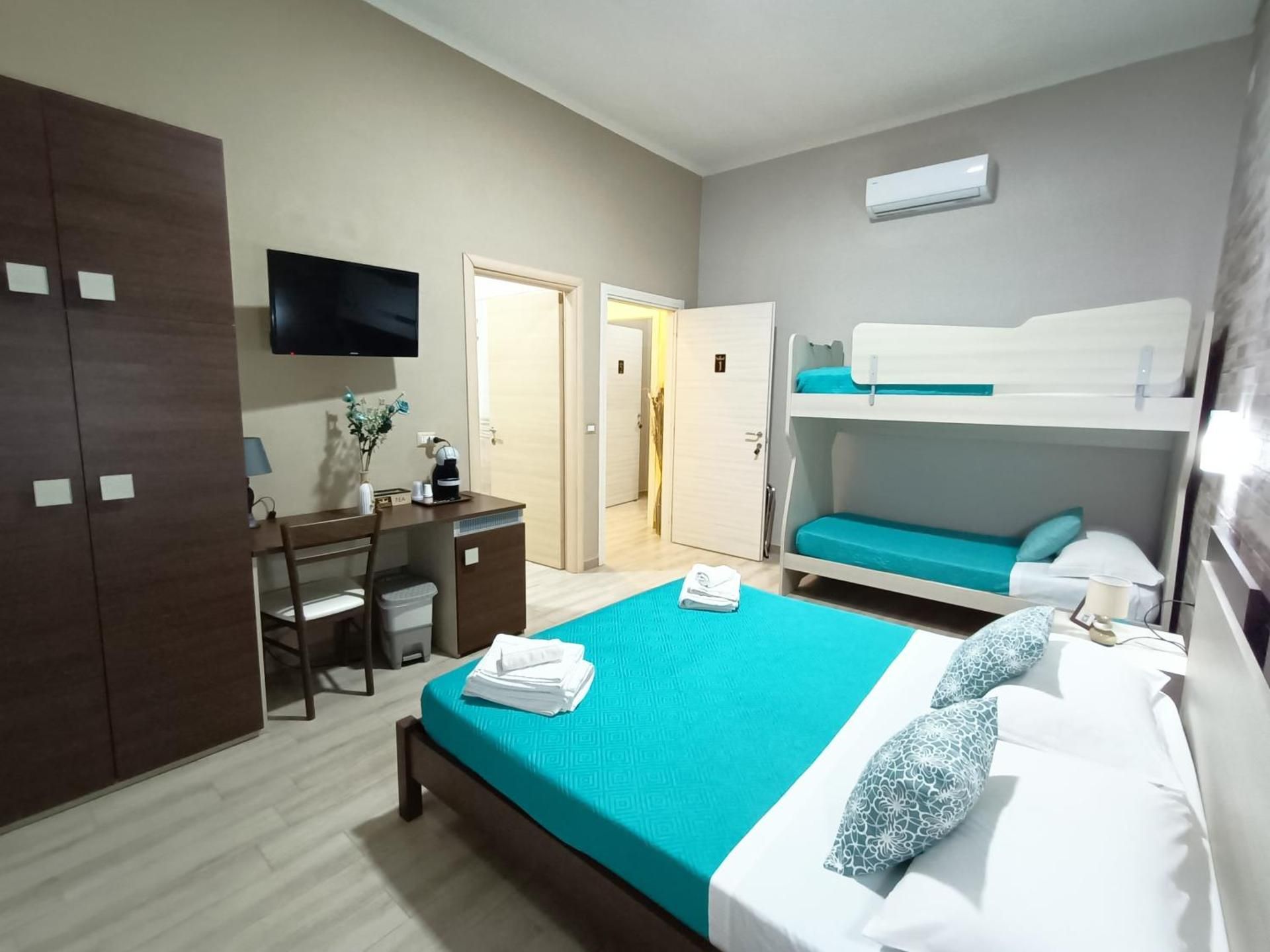 Quadruple Room with Private Bathroom
