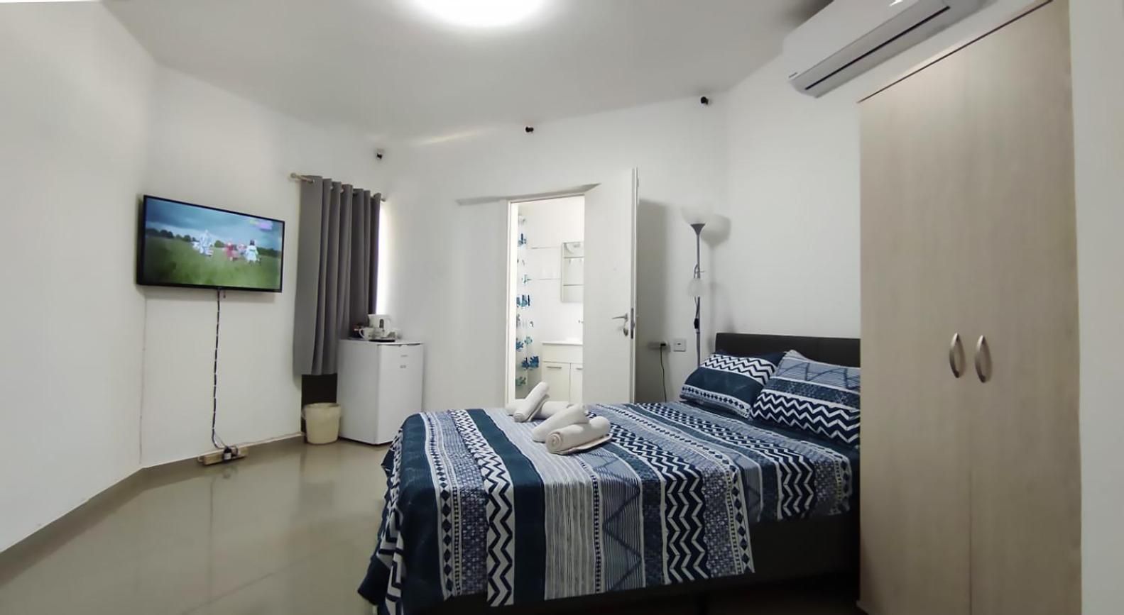 Quadruple Room with Private Bathroom