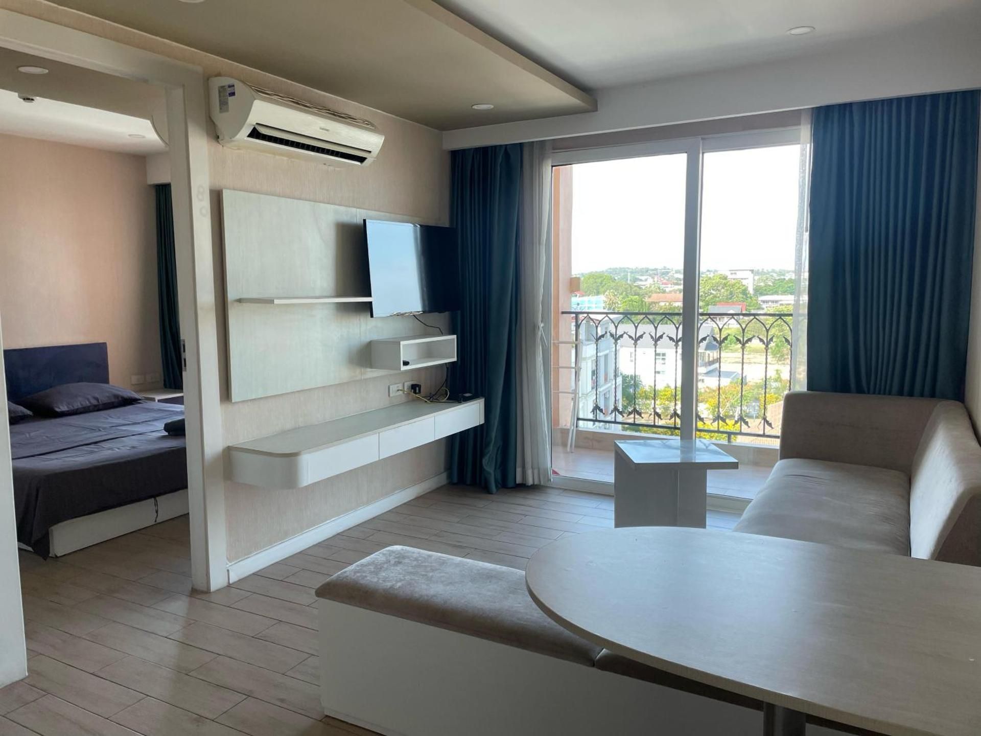 One-Bedroom Apartment with Balcony and City View