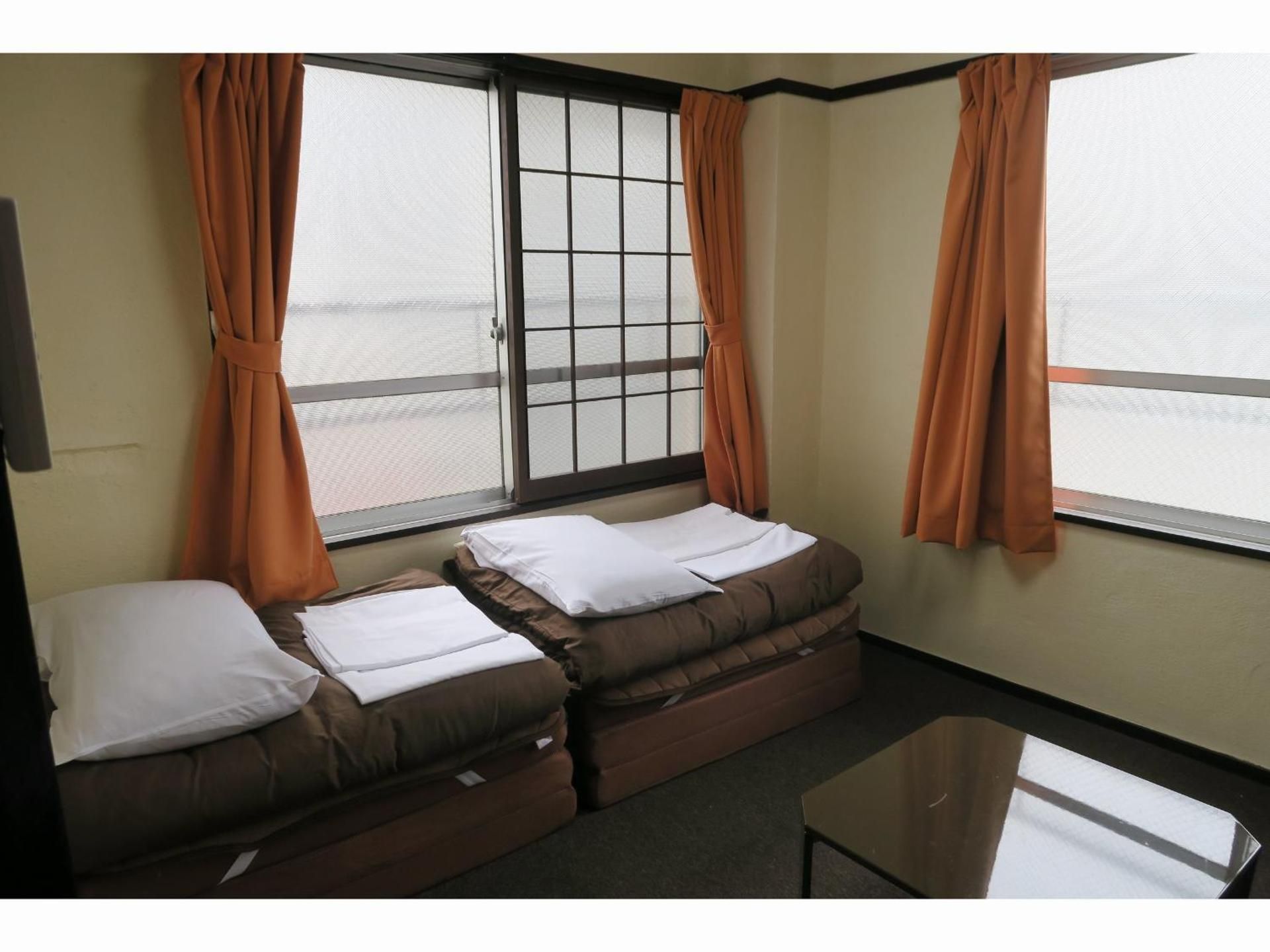 Quad Room with Shared Bathroom