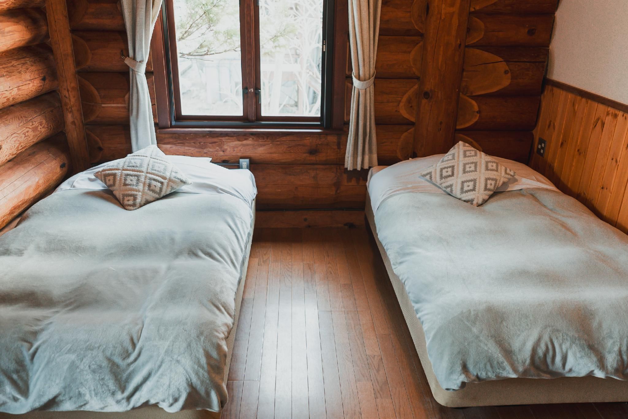 Log Hotel Twin Room 112-115 with En-Suite