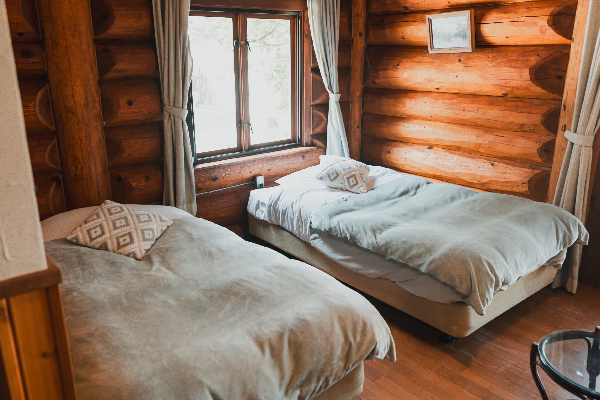 Log Hotel Twin Room 112-115 with En-Suite