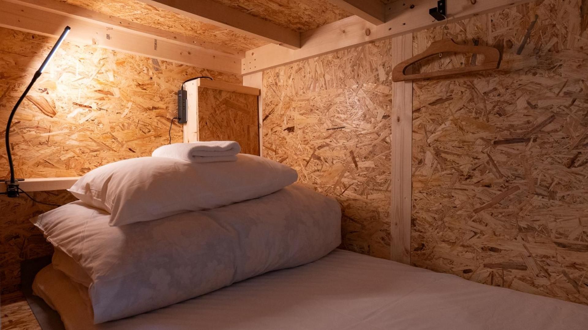 Single Bed in Dormitory Room