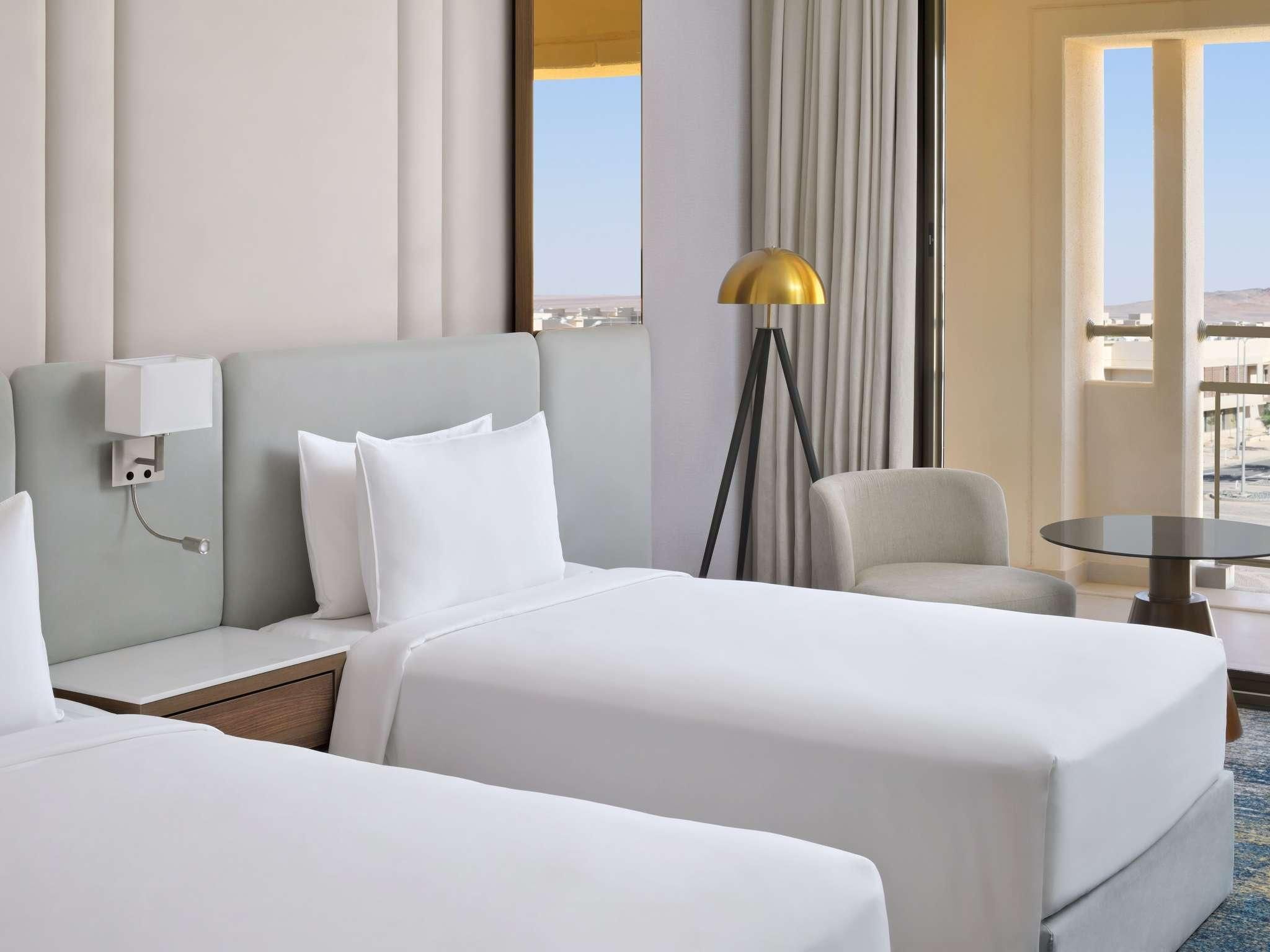 Deluxe Room with 2 Single Beds and Pool View