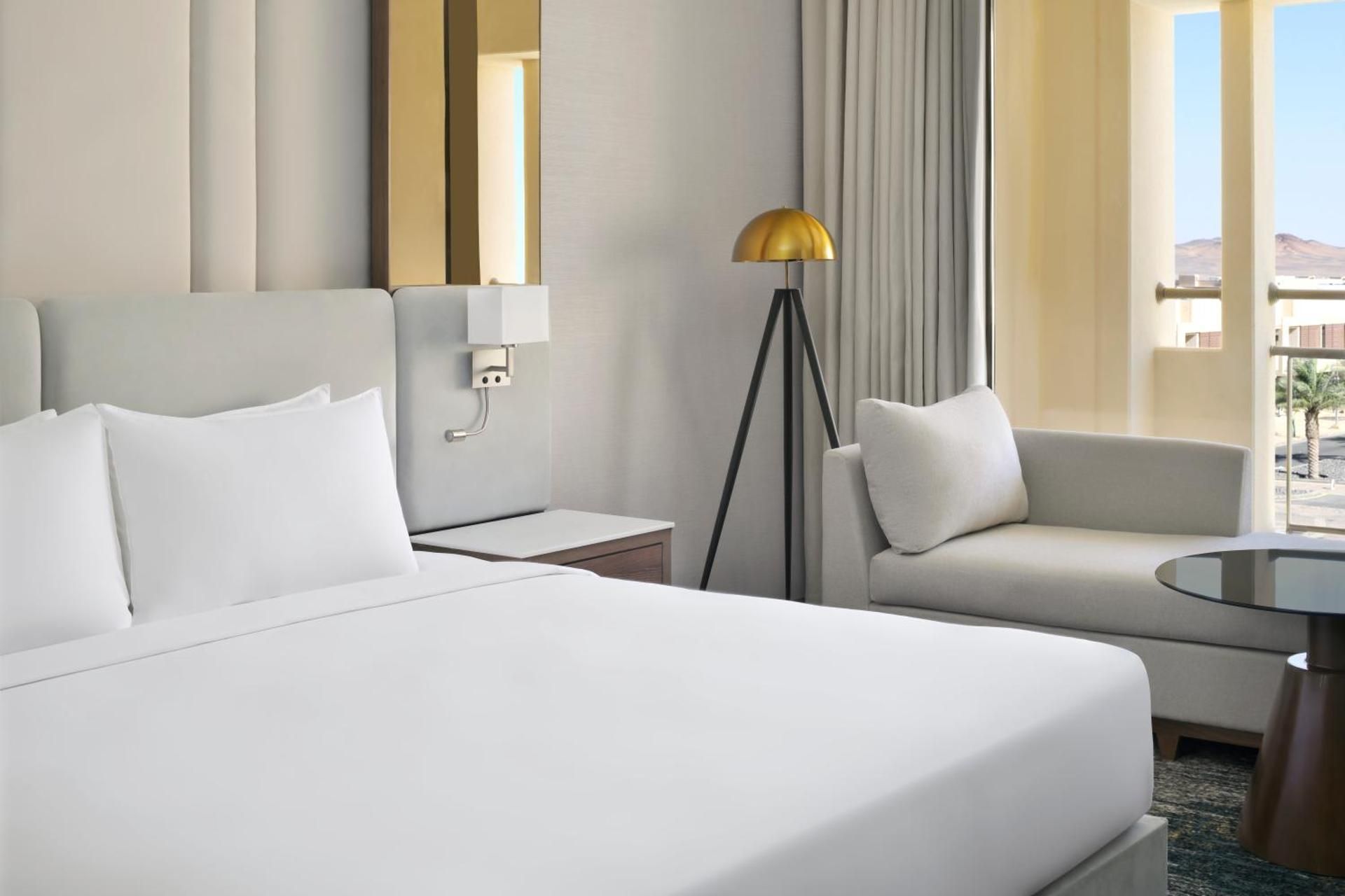 One-Bedroom Executive Queen Suite with Kitchen and Balcony